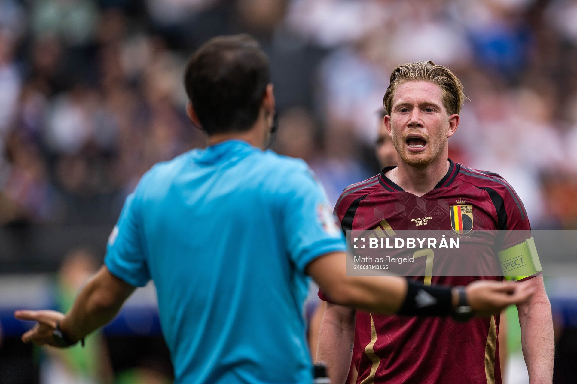 Kevin De Bruyne of Belgium reacts towards referee Umut Meler