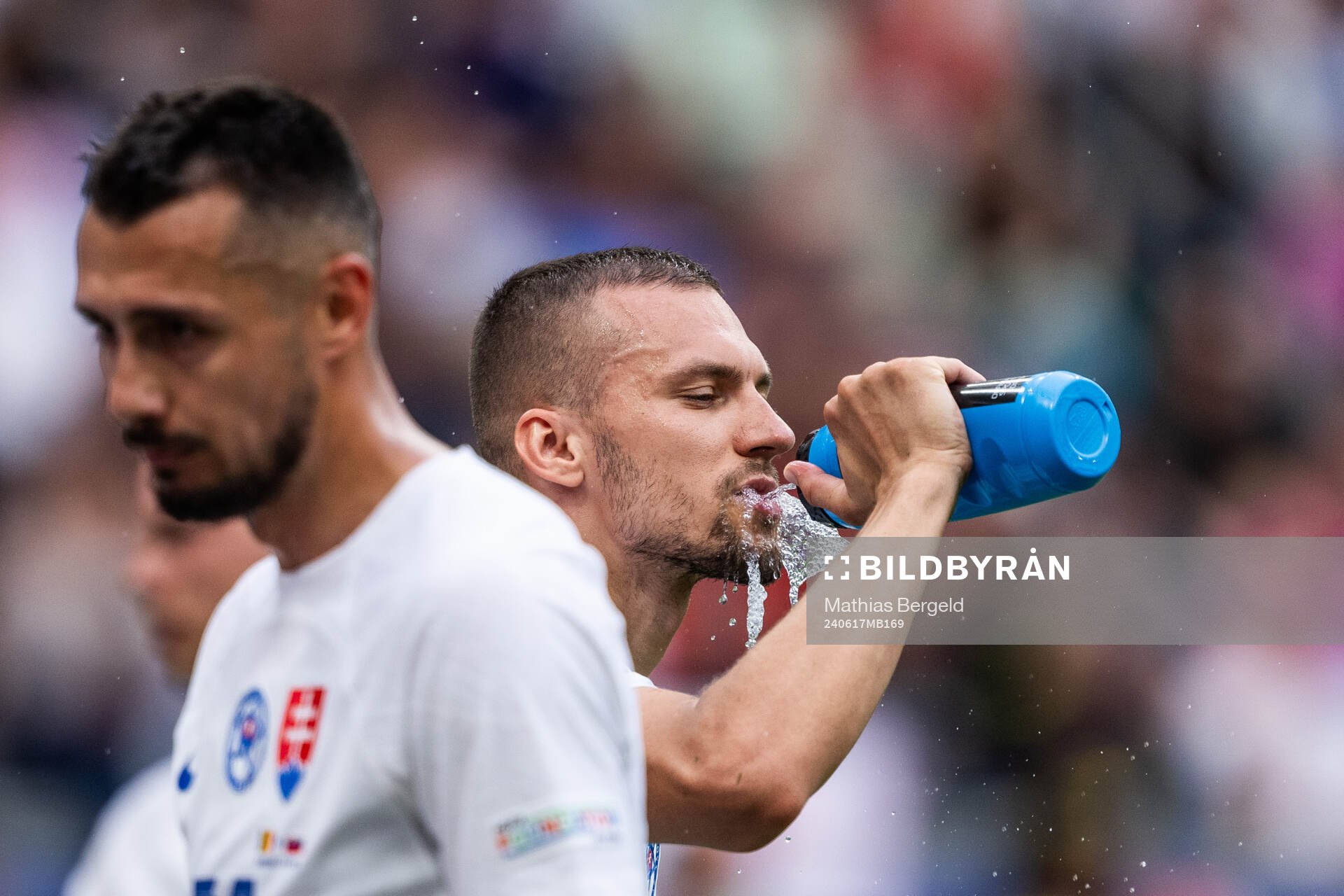 Lukas Haraslin of Slovakia drinks water
