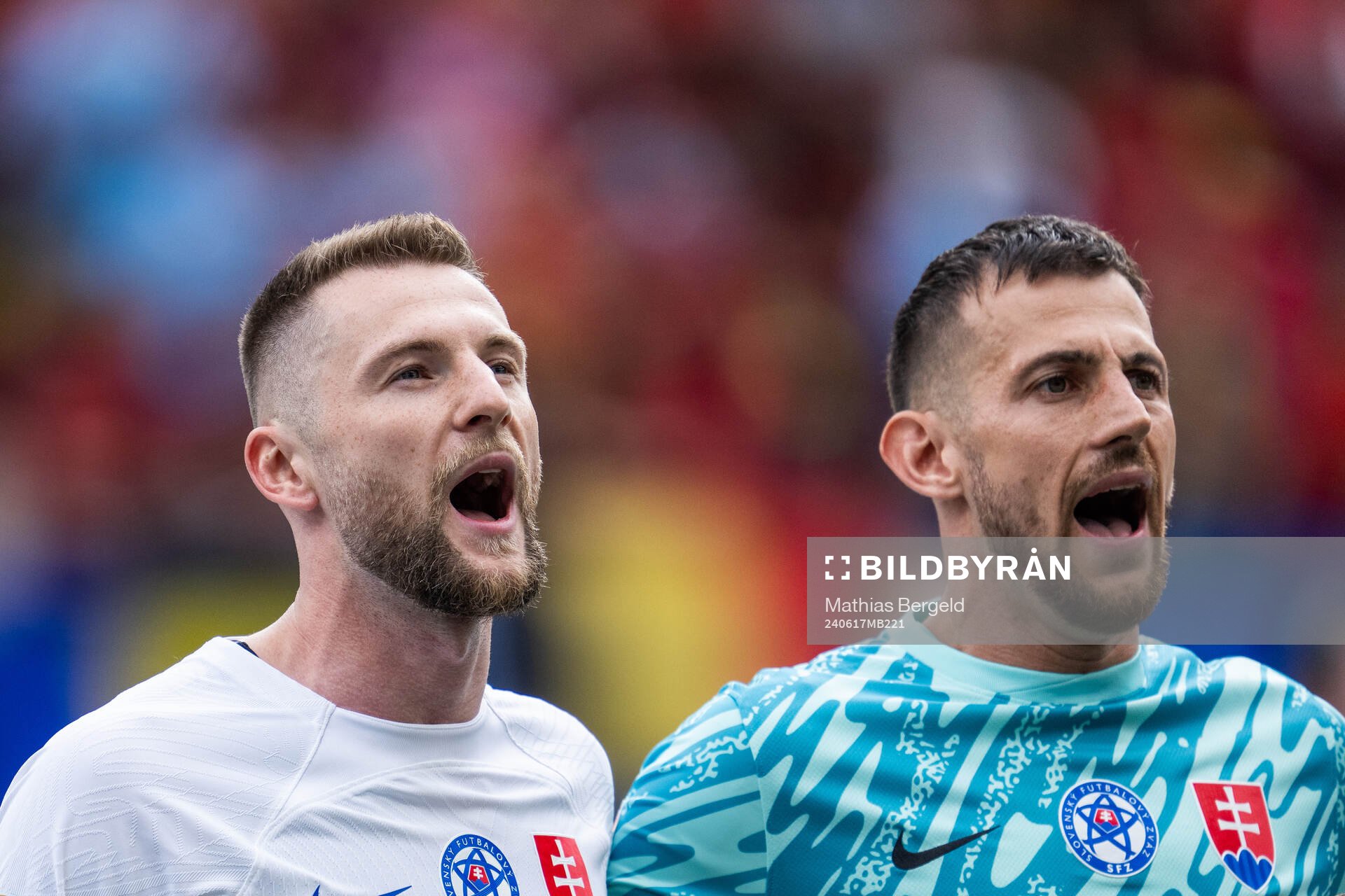 Milan Skriniar and goalkeeper Martin Dubravka of Slovakia