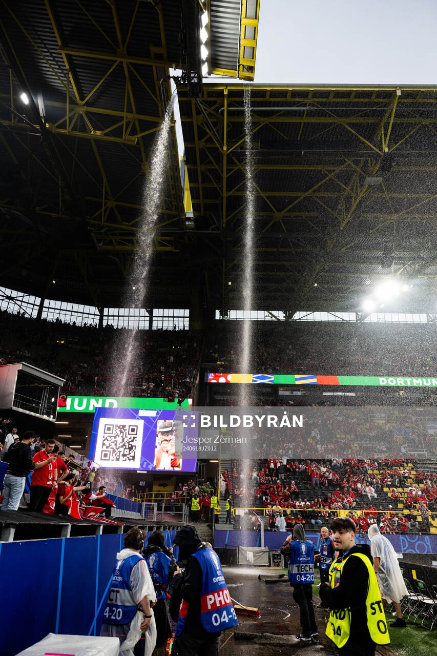 General view as rain falls inside the stadium