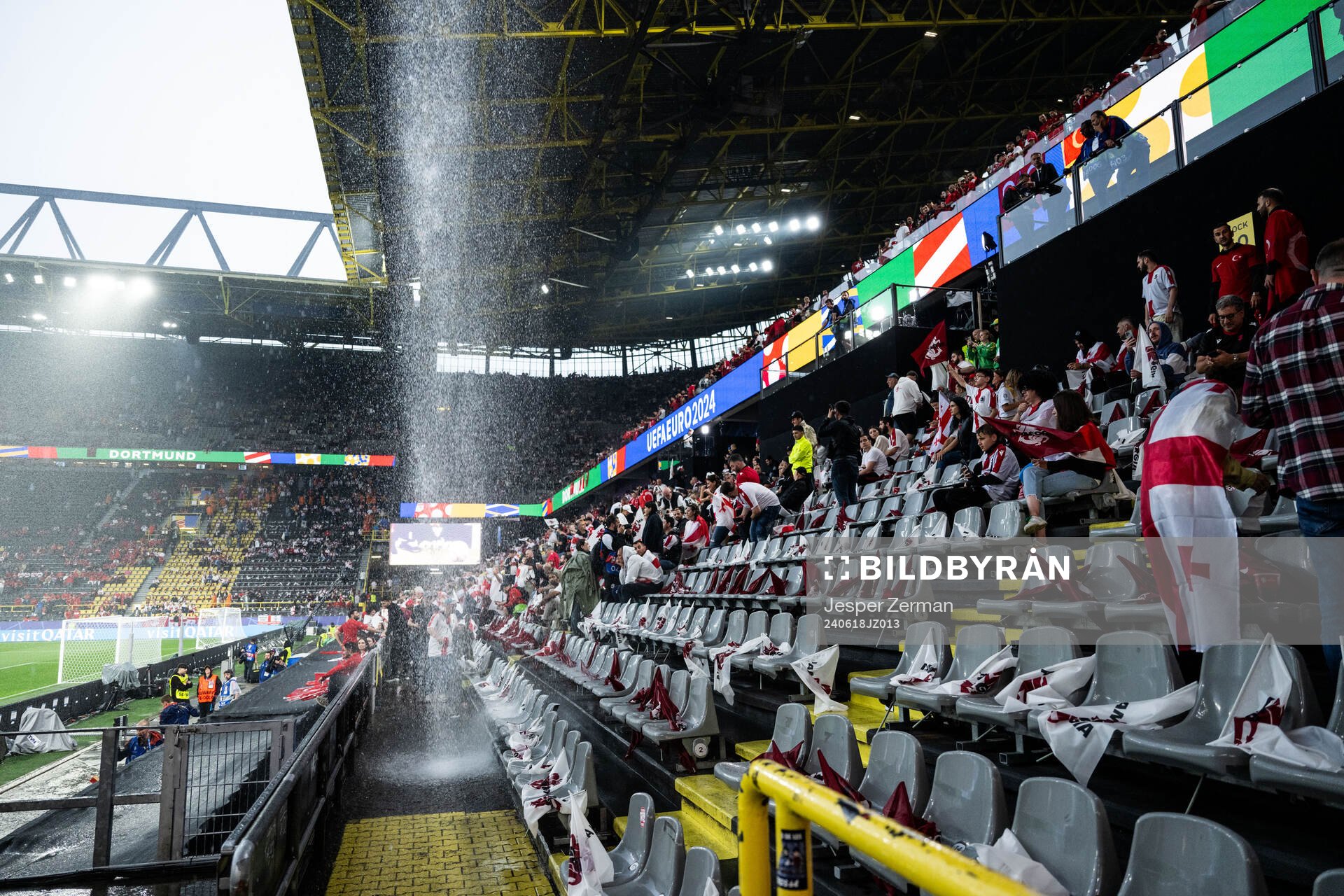 General view as rain falls inside the stadium