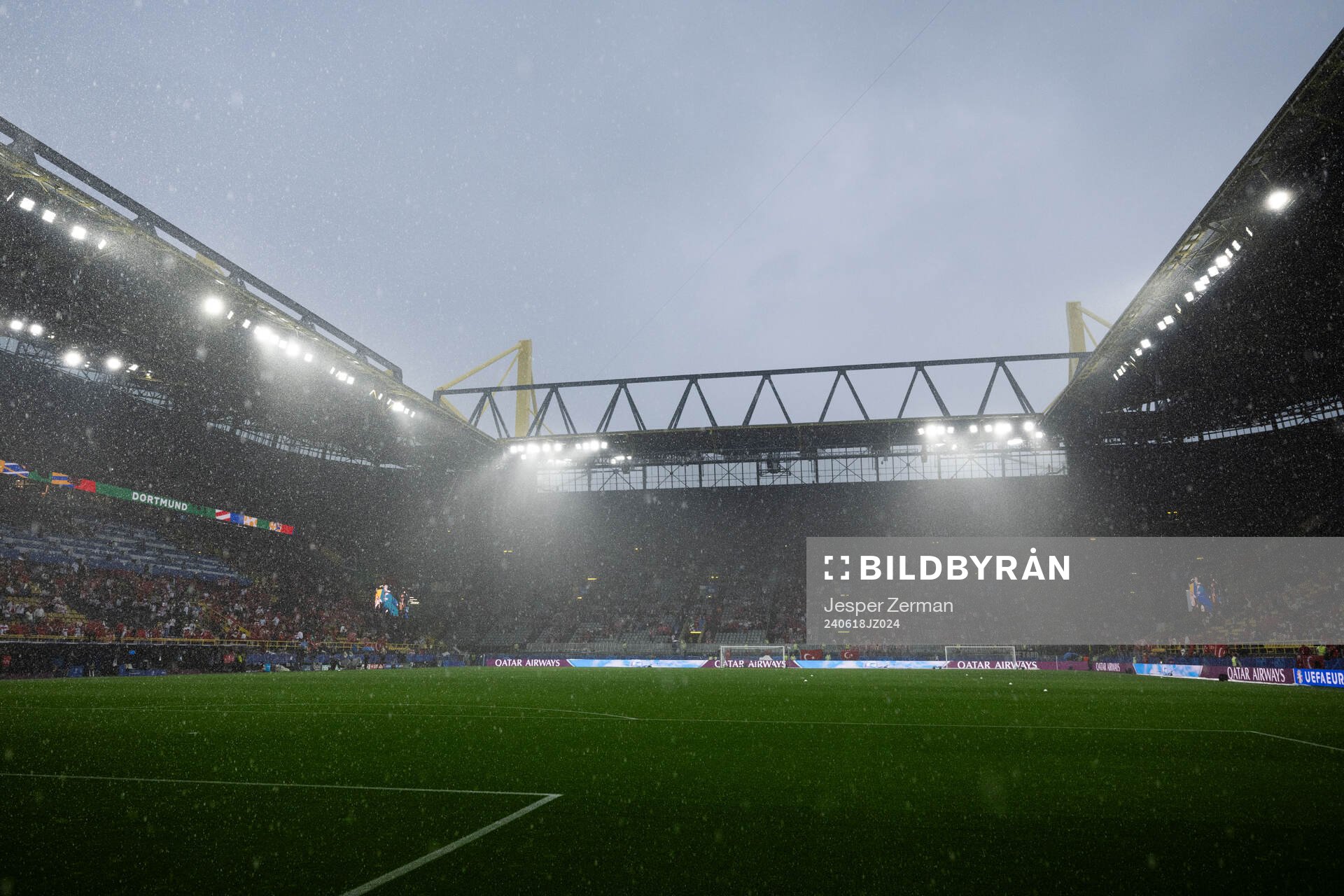 General view as rain falls inside the stadium ahead of the UEFA Euro 2024 Football Championship match between Türkiye and Georgia on June 18, 2024 in Dortmund. 