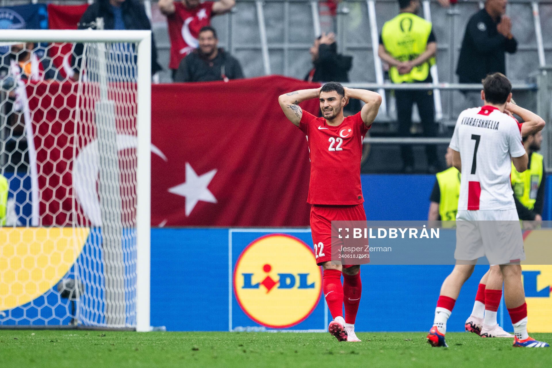 Kaan Ayhan of Türkiye looks dejected