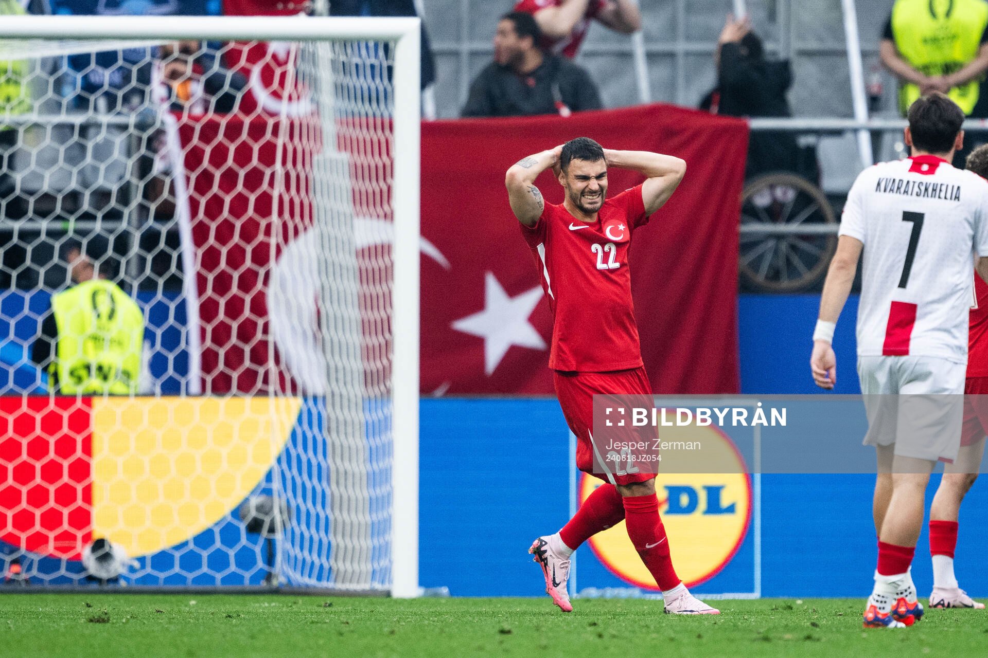 Kaan Ayhan of Türkiye looks dejected