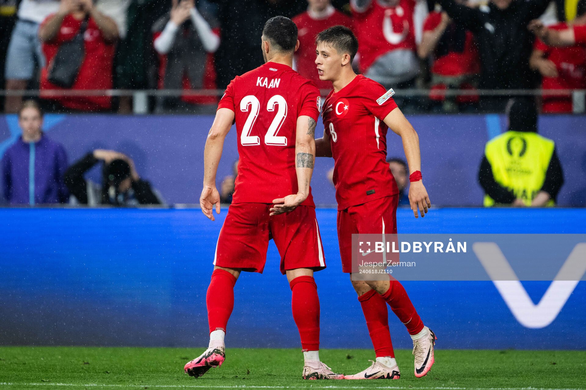 Arda Guler of Türkiye celebrates with Kaan Ayhan