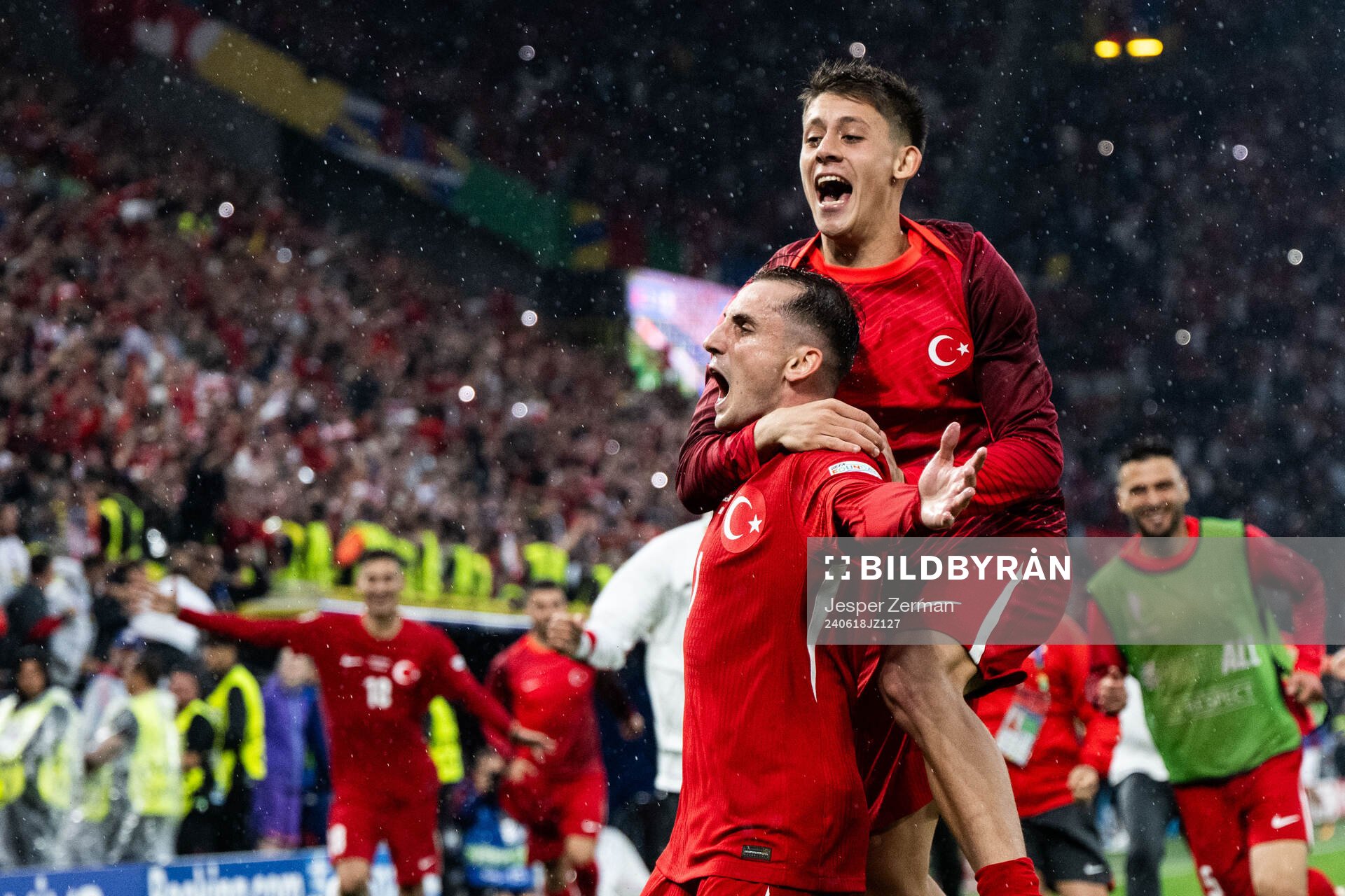 Kerem Akturkoglu of Türkiye celebrates with Arda Guler