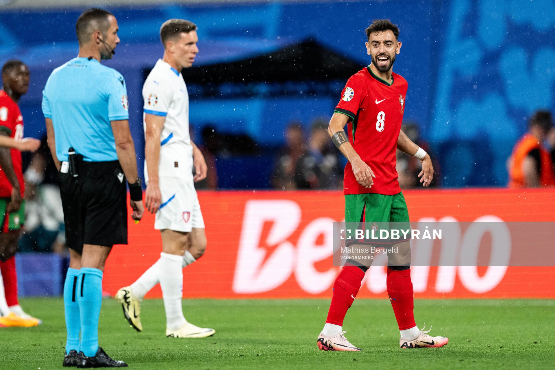 Bruno Fernandes of Portugal reacts towards referee Marco