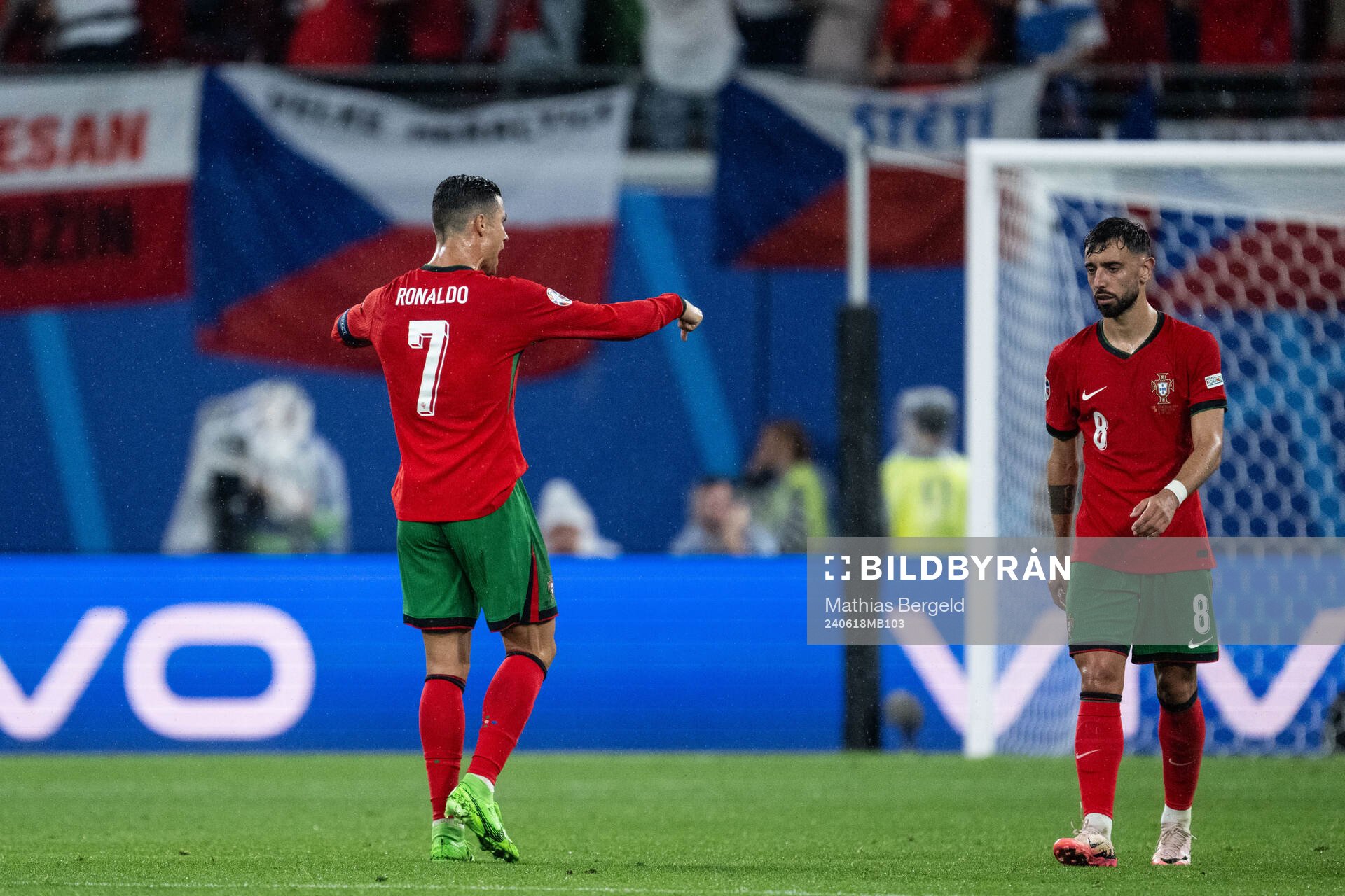 Cristiano Ronaldo of Portugal reacts and Bruno Fernandes
