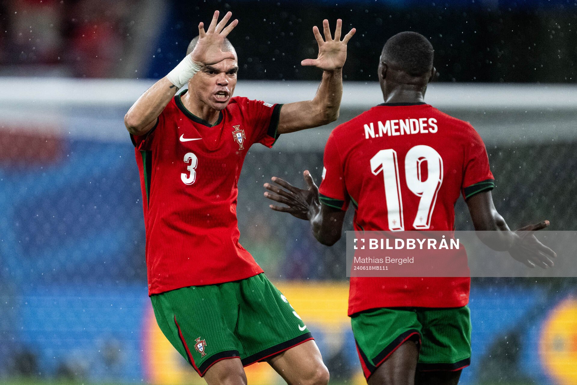 Pepe and Nuno Mendes of Portugal celebrates