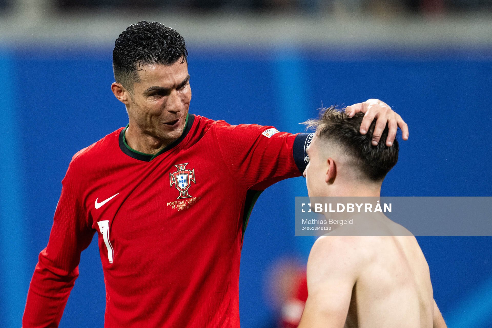 Francisco Conceicao of Portugal celebrates with Cristiano