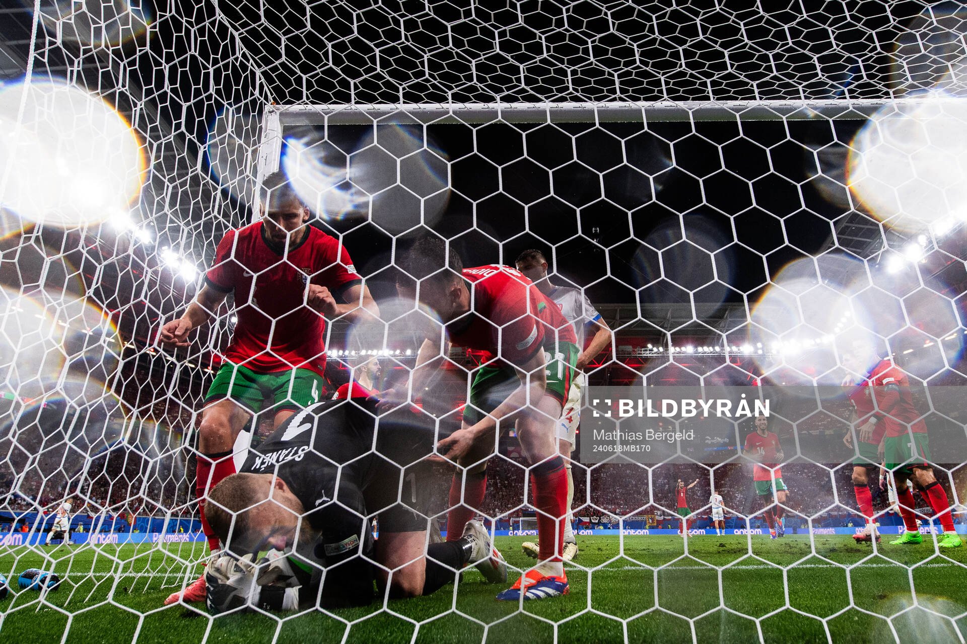 Goalkeeper Jindfich Stanek of Czech Republic fights with