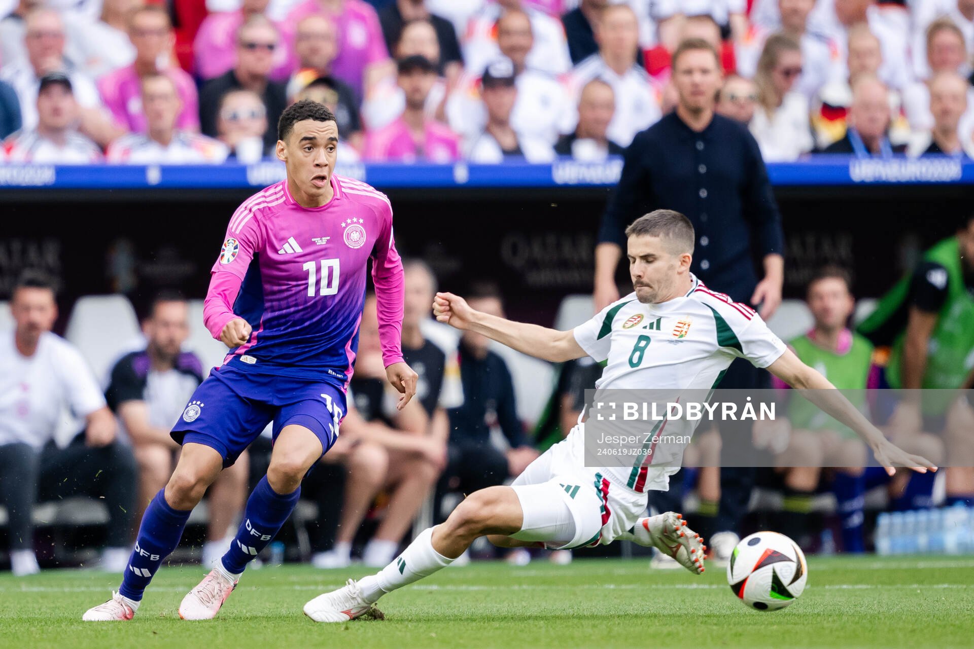 Jamal Musiala of Germany and Adam Nagy of Hungary