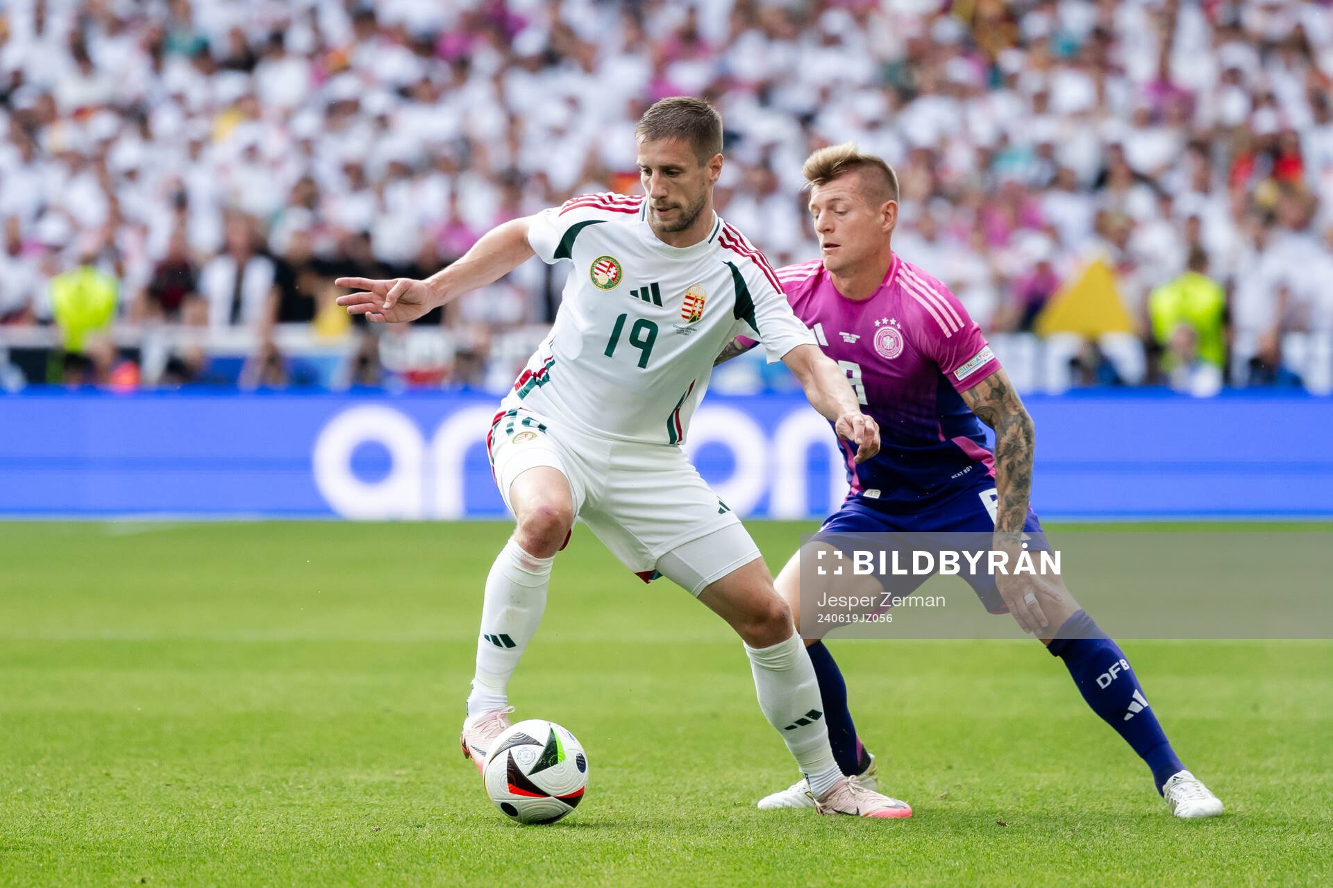 Barnabas Varga of Hungary and Toni Kroos of Germany