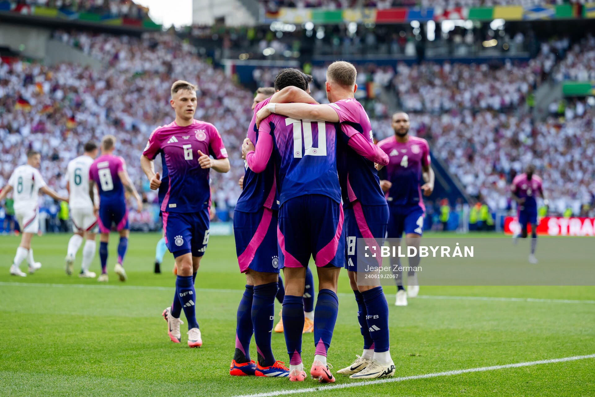 Jamal Musiala of Germany celebrates with teammates