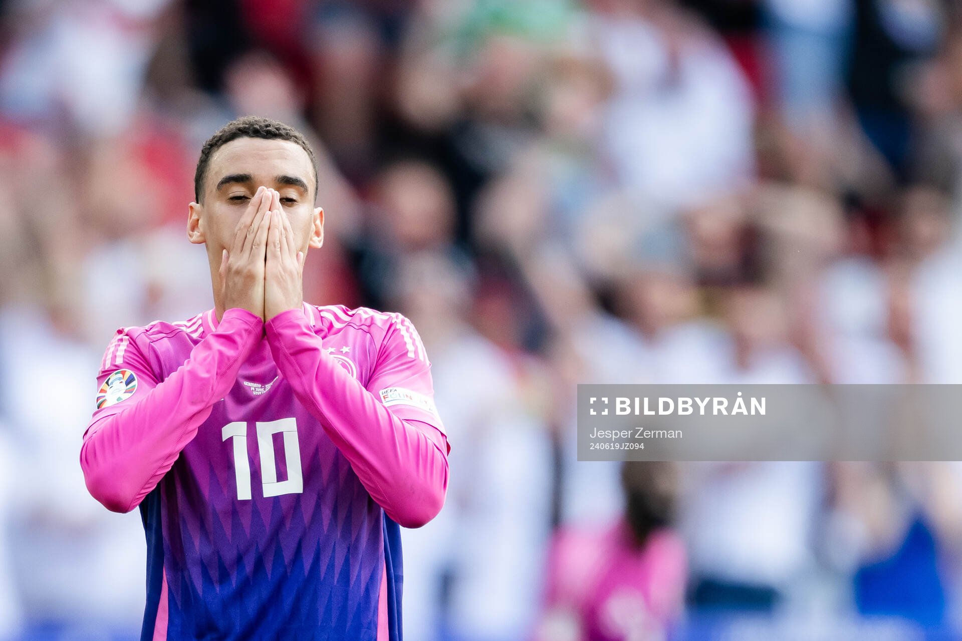 Jamal Musiala of Germany looks dejected