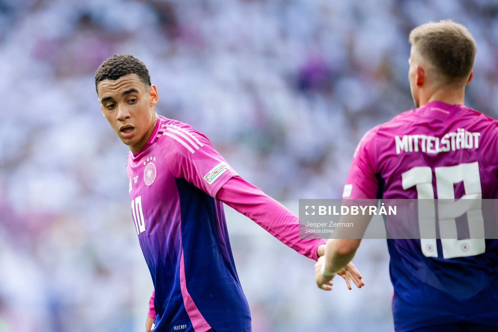 Jamal Musiala and Maximilian Mittelstädt of Germany