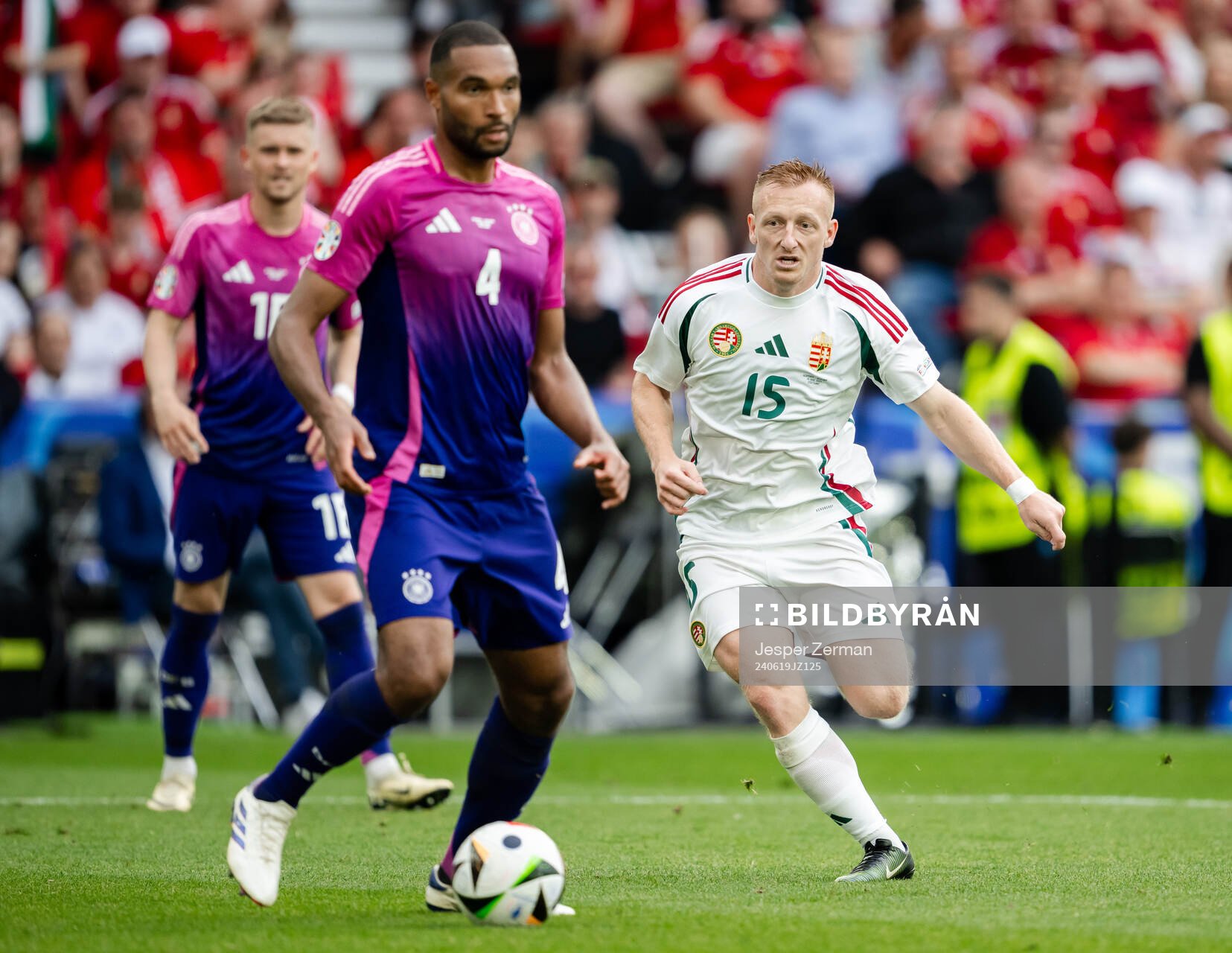 Jonathan Tah of Germany and Laszlo Kleinheisler of Hungary