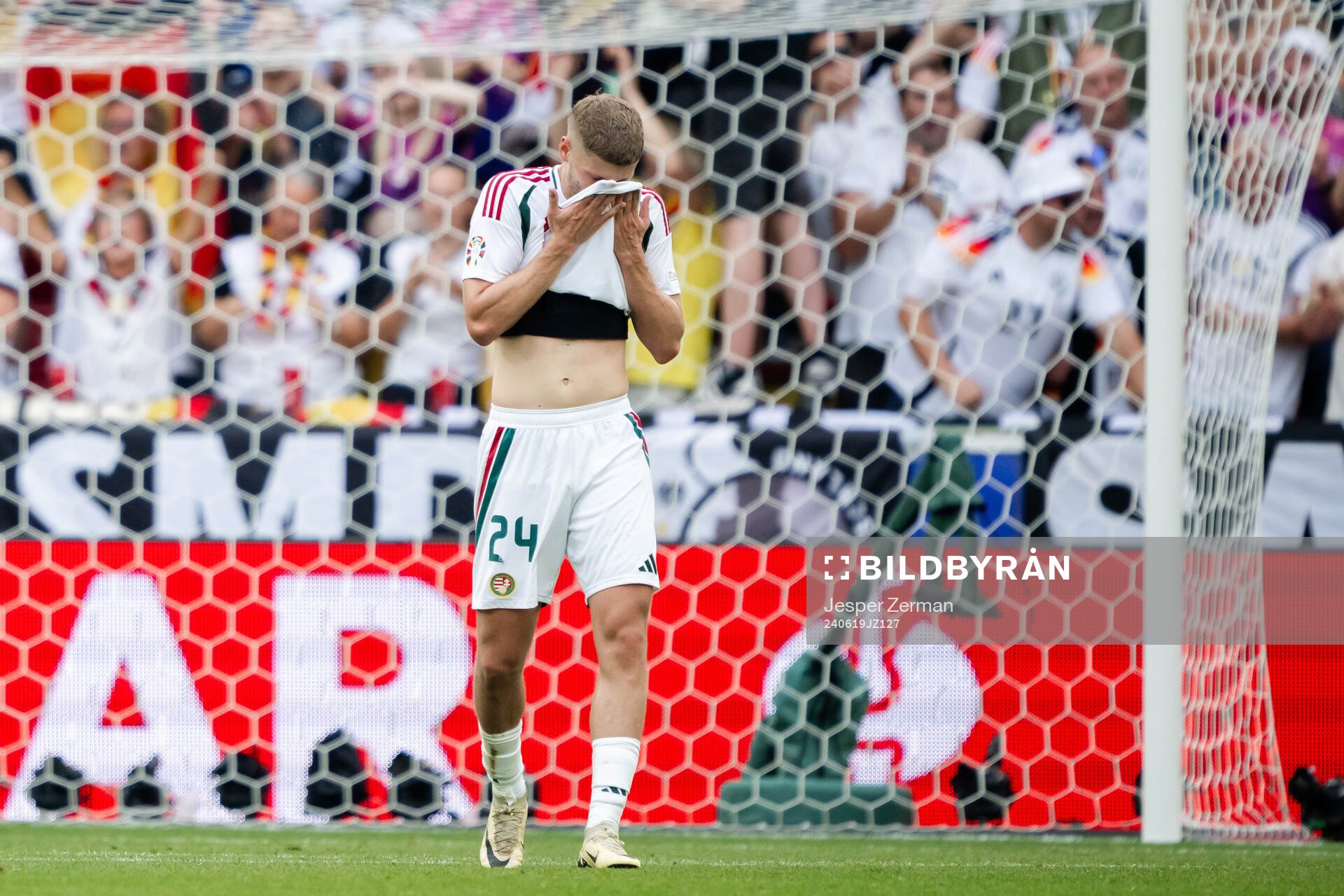 Marton Dardai of Hungary looks dejected