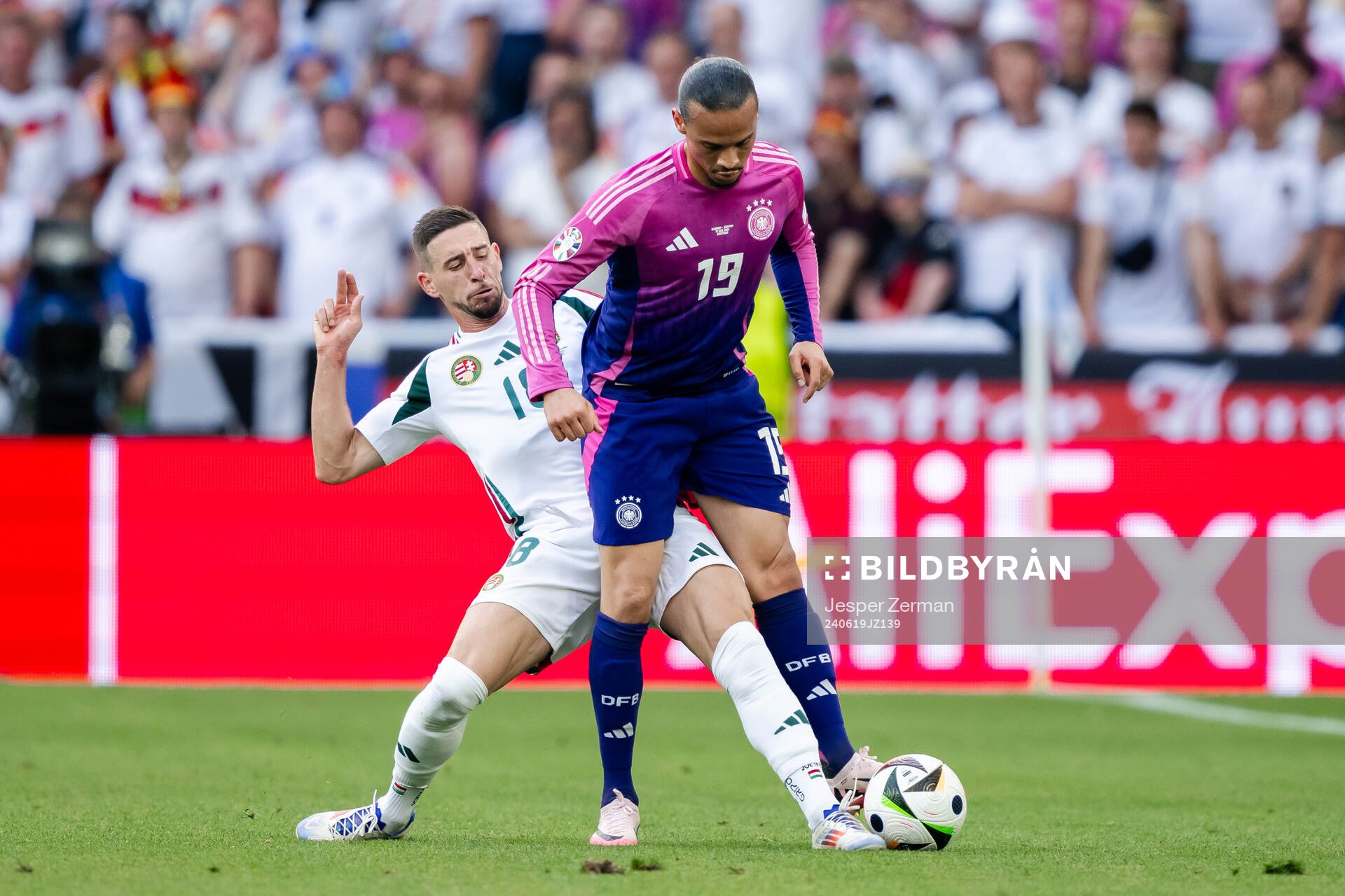 Zsolt Nagy of Hungary and Leroy Sane of Germany