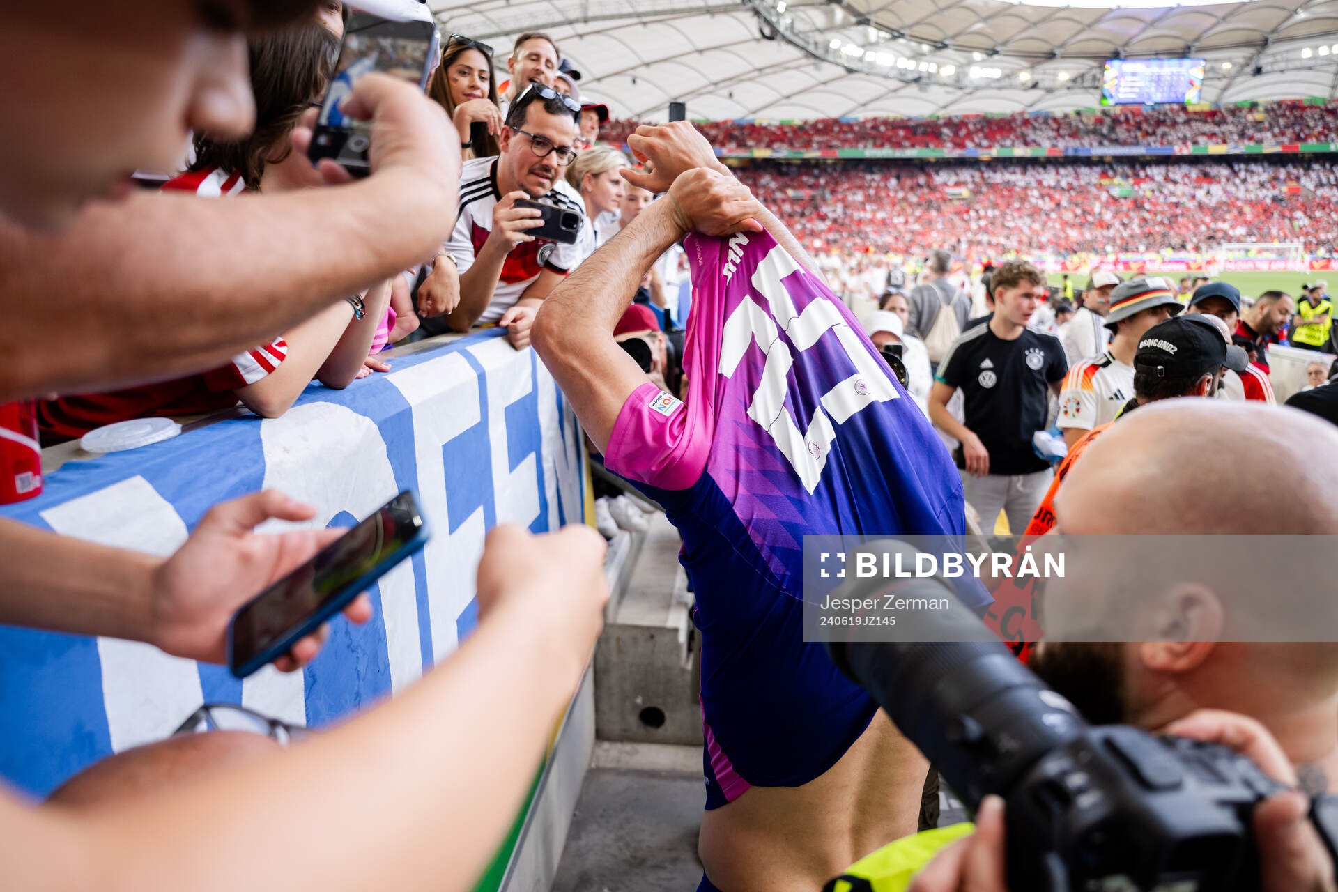 Emre Can of Germany with fans
