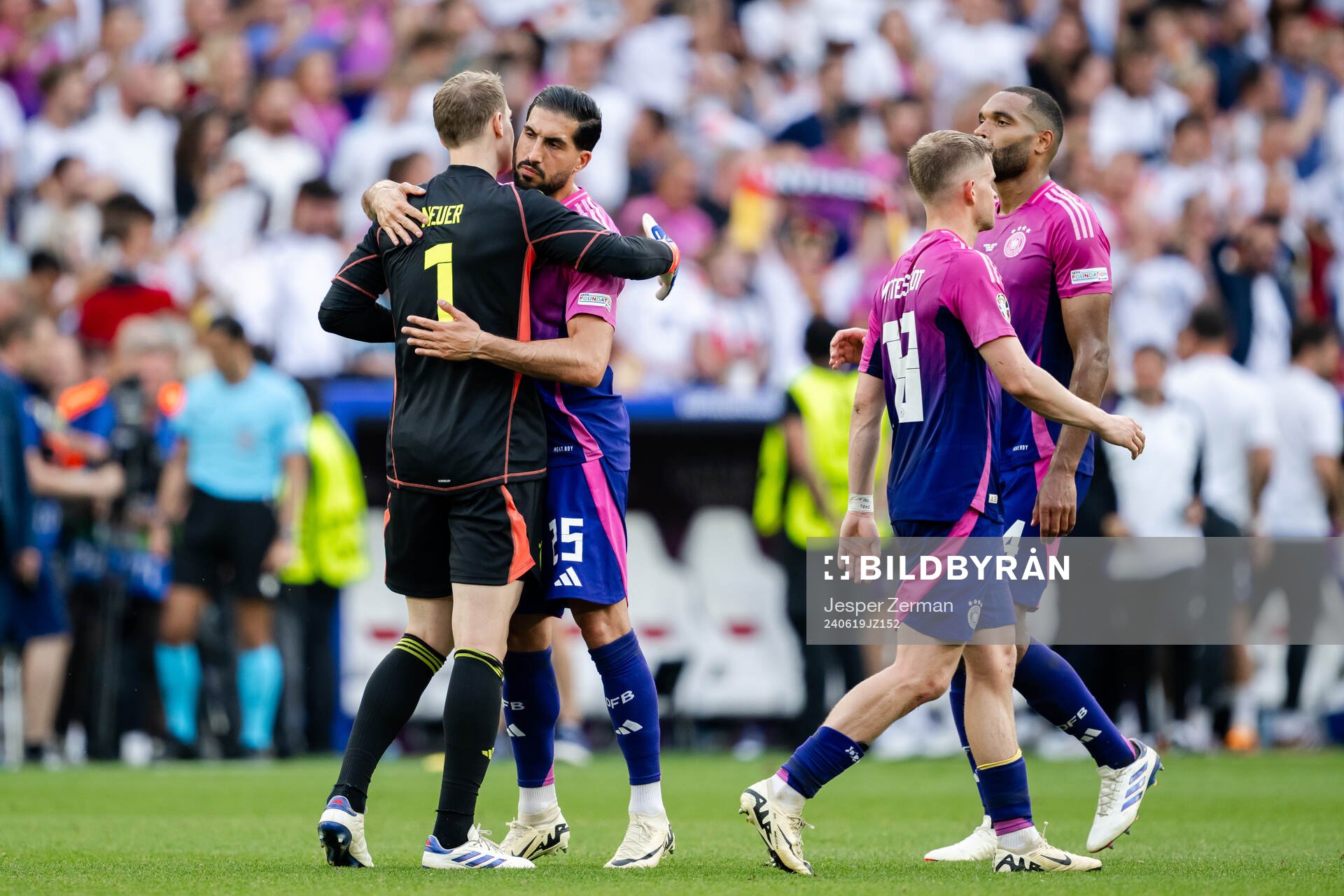 Goalkeeper Manuel Neuer and Emre Can of Germany