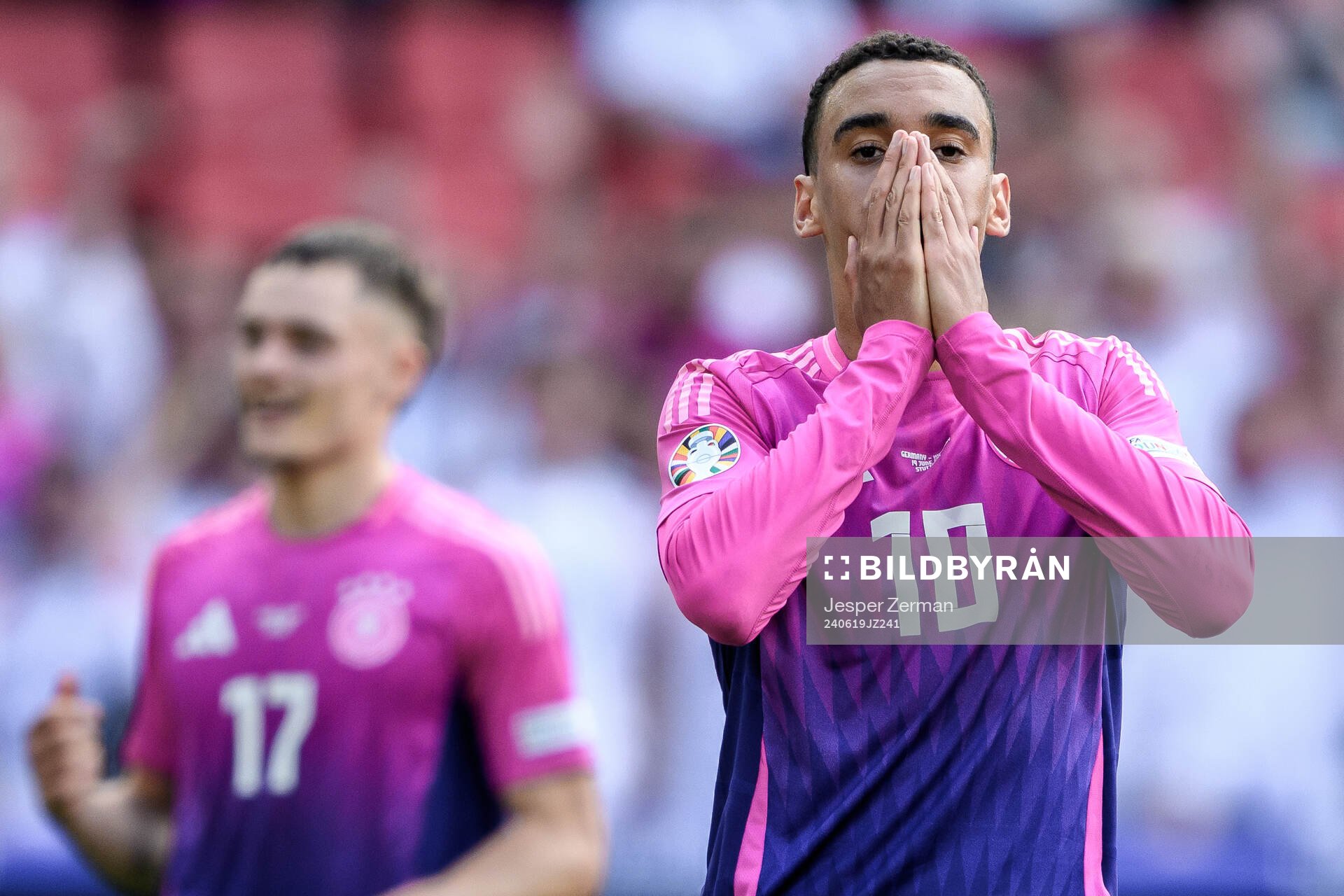 Jamal Musiala of Germany looks dejected