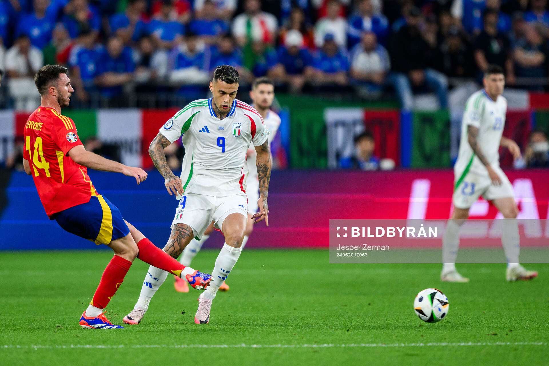 Aymeric Laporte of Spain and Gianluca Scamacca of Italy