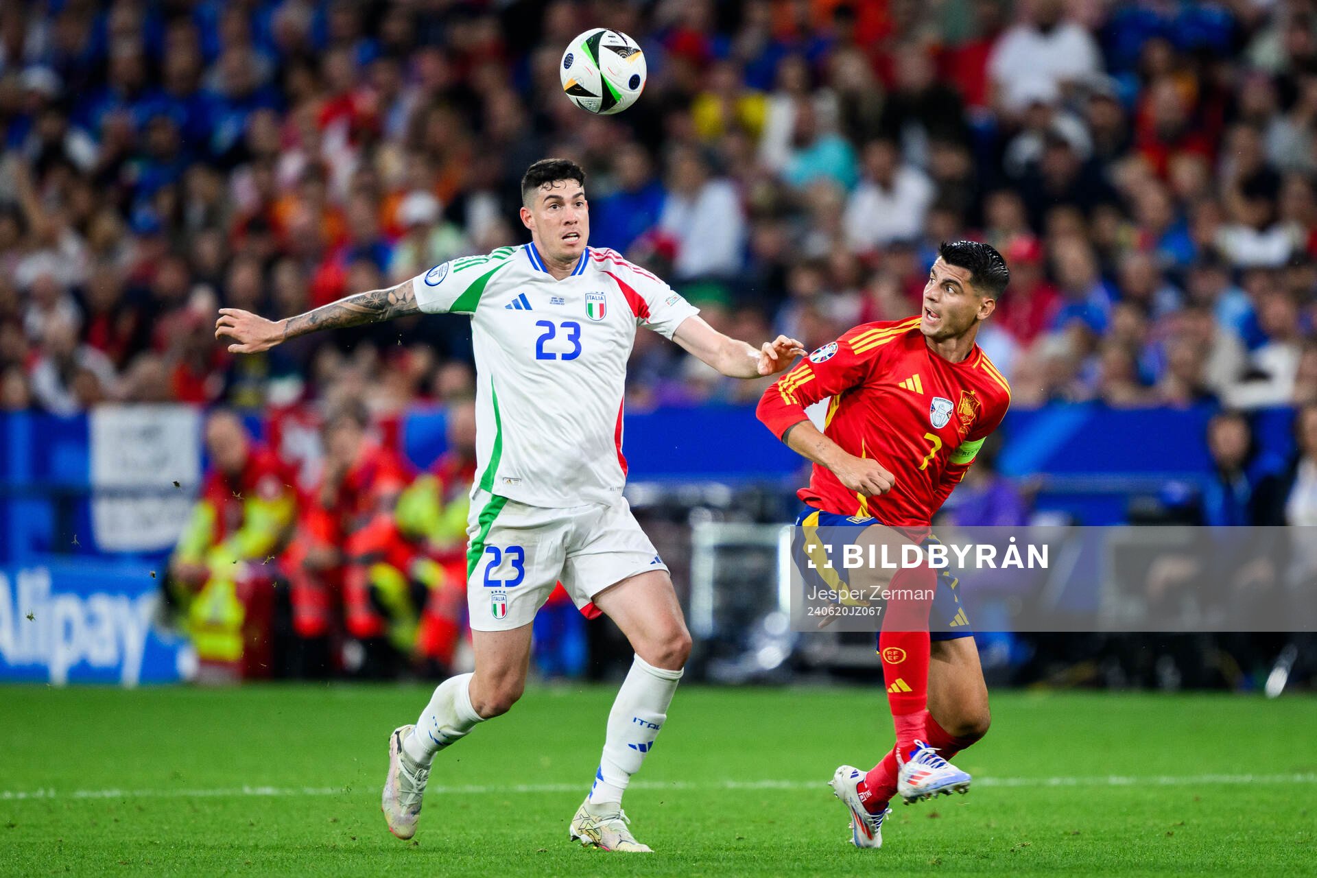 Alessandro Bastoni of Italy and Alvaro Morata of Spain