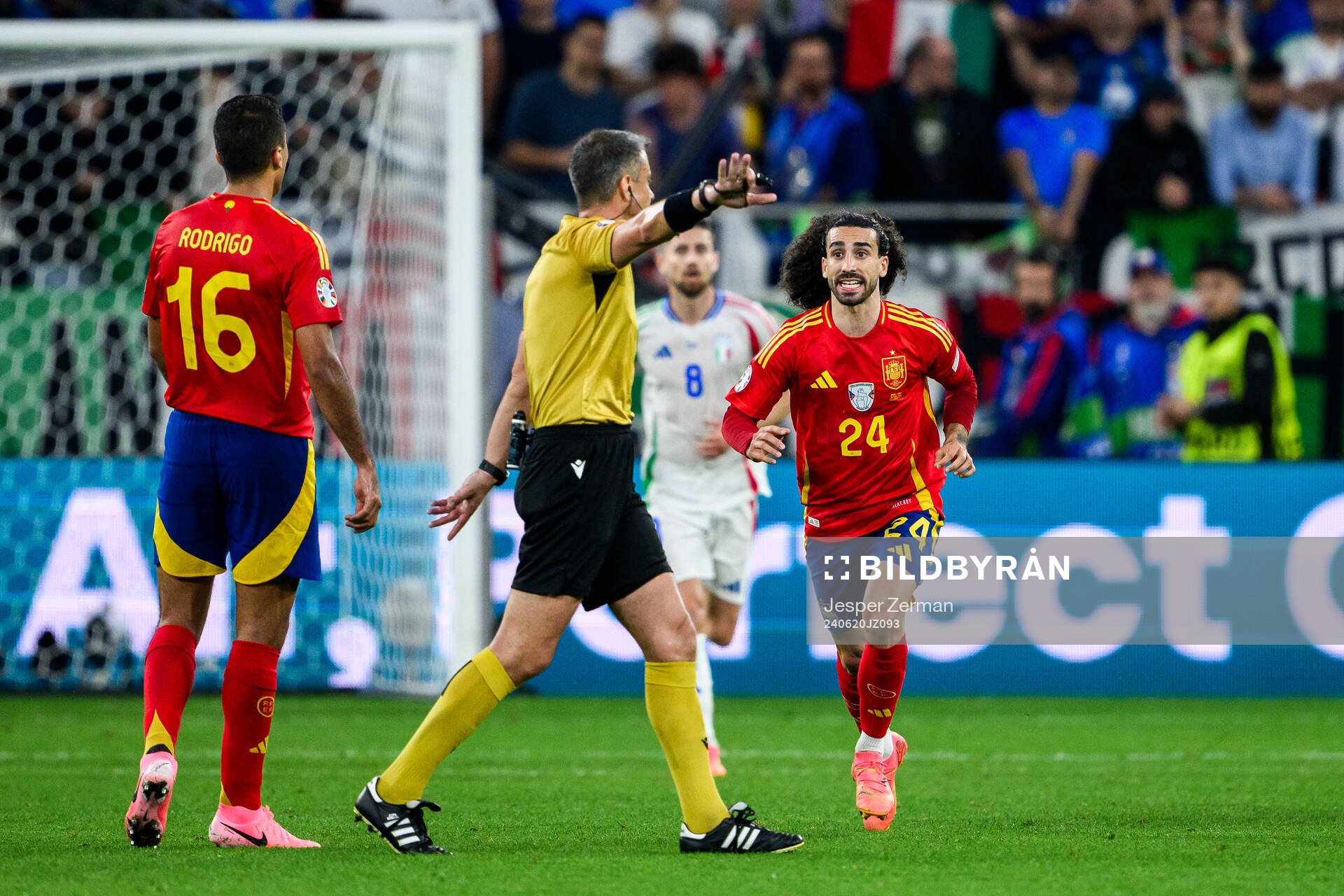 Marc Cucurella of Spain reacts towards Referee Slavko Vincic