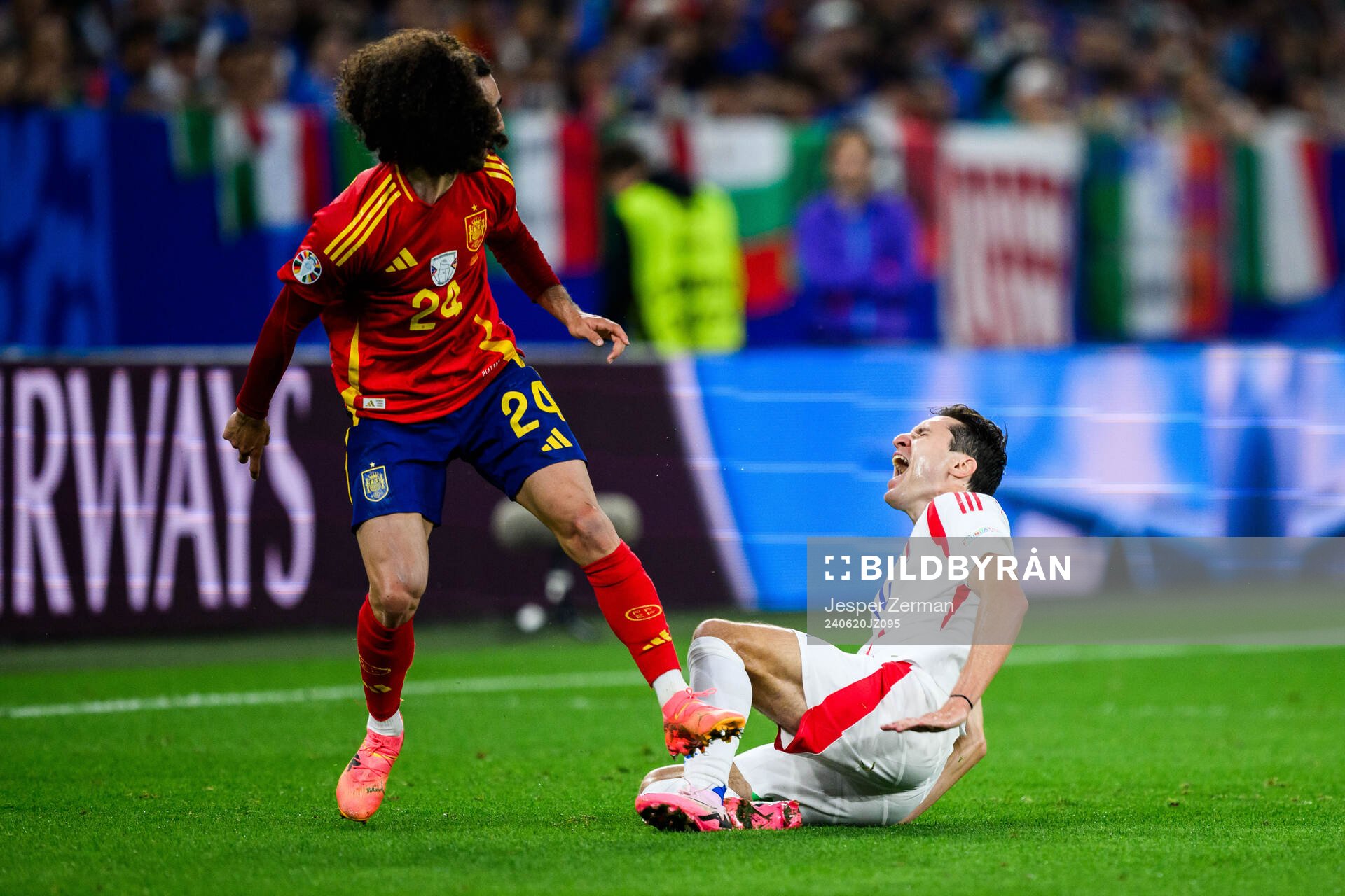 Marc Cucurella of Spain and Federico Chiesa of Italy