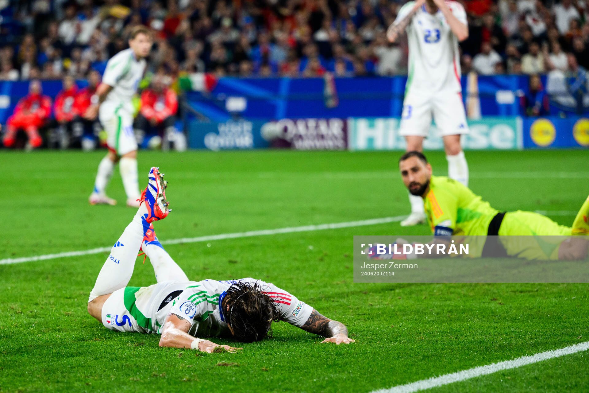 Riccardo Calafiori of Italy looks dejected