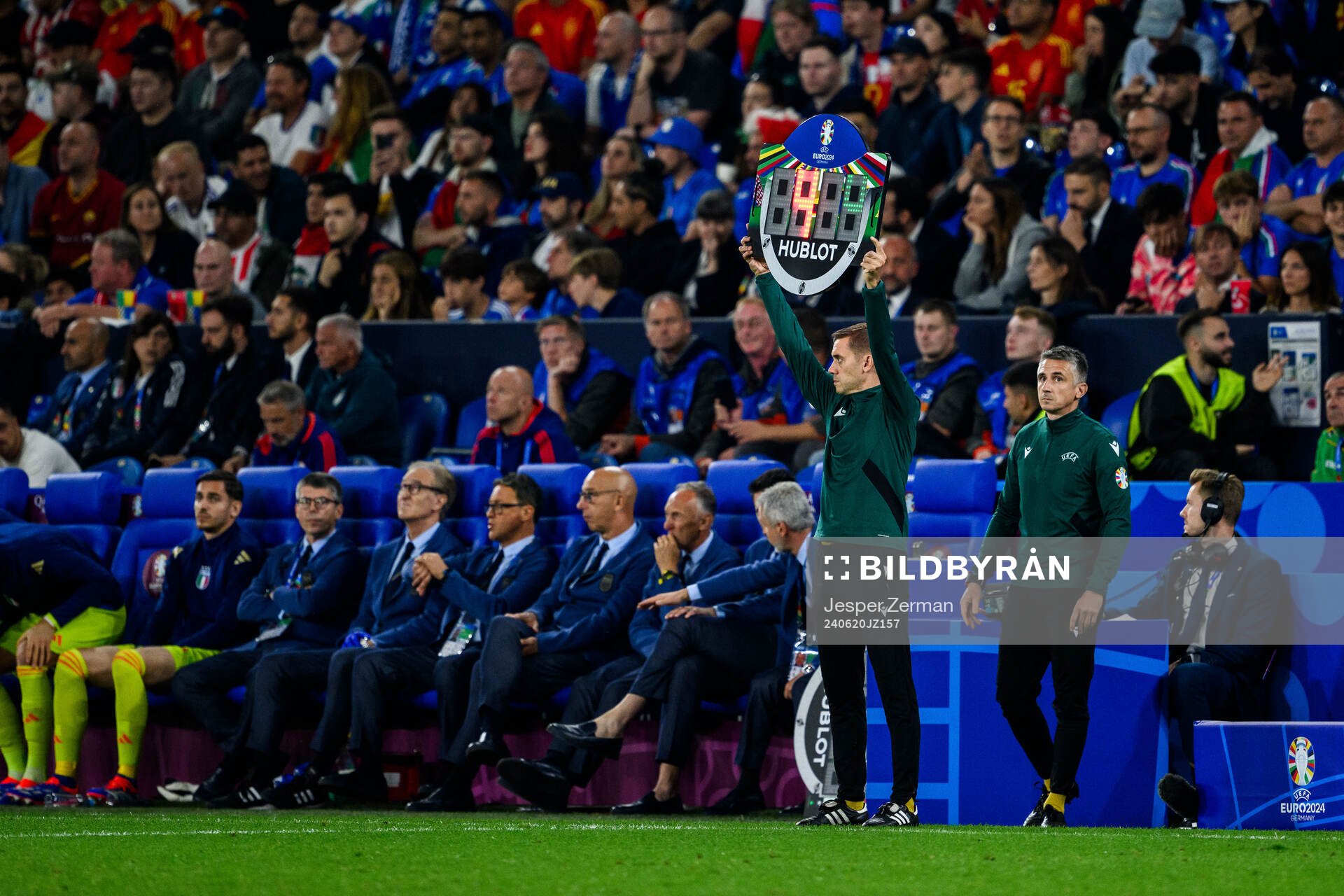 The fourth official Clément Turpin holds up a sign showing