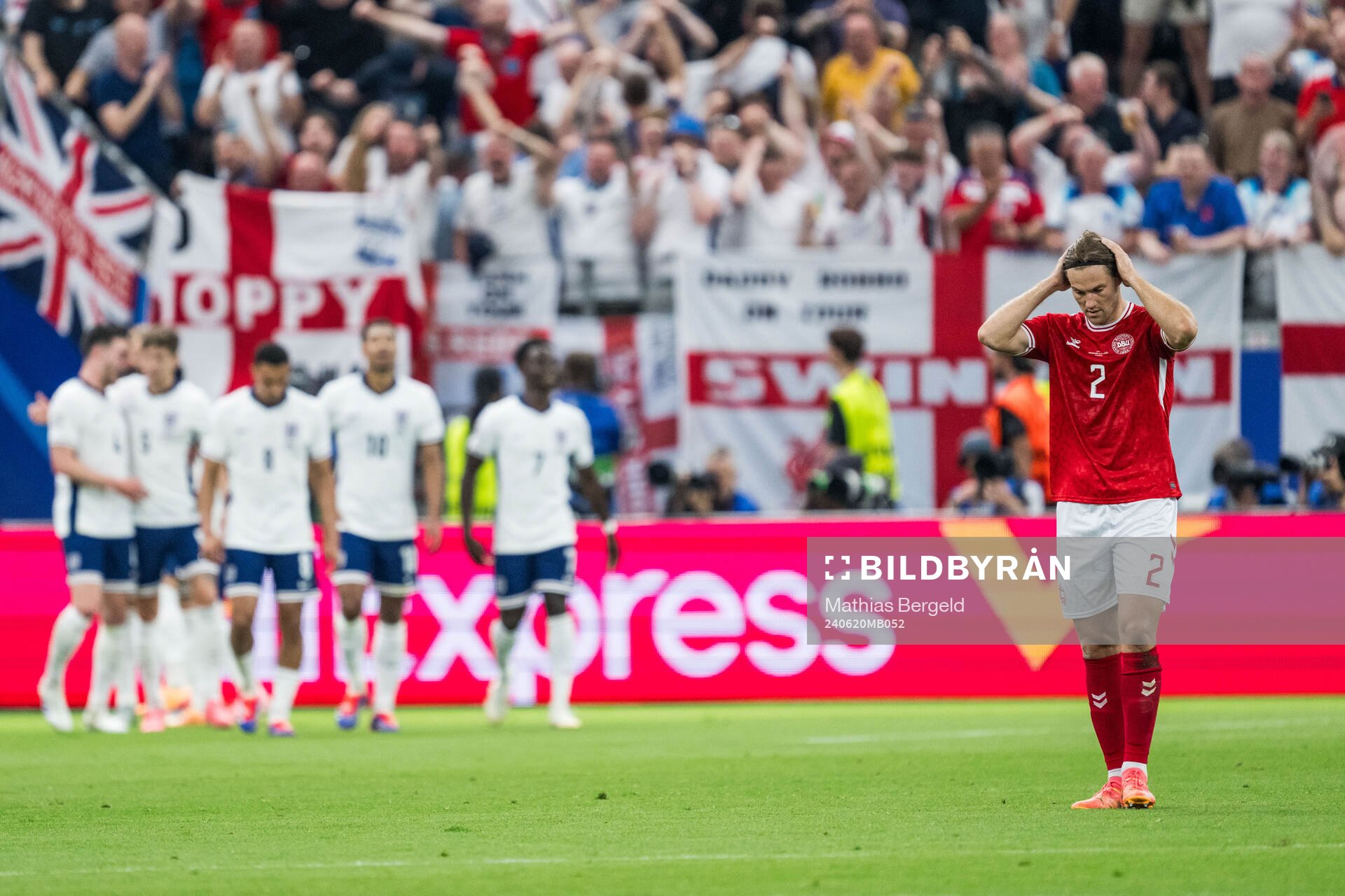 Joachim Christian Andersen of Denmark looks dejected