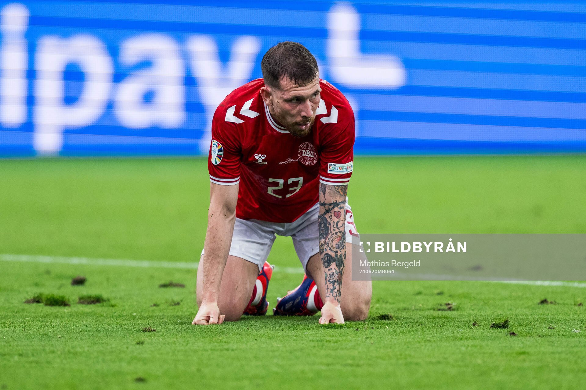 Pierre-Emil Højberg of Denmark looks dejected