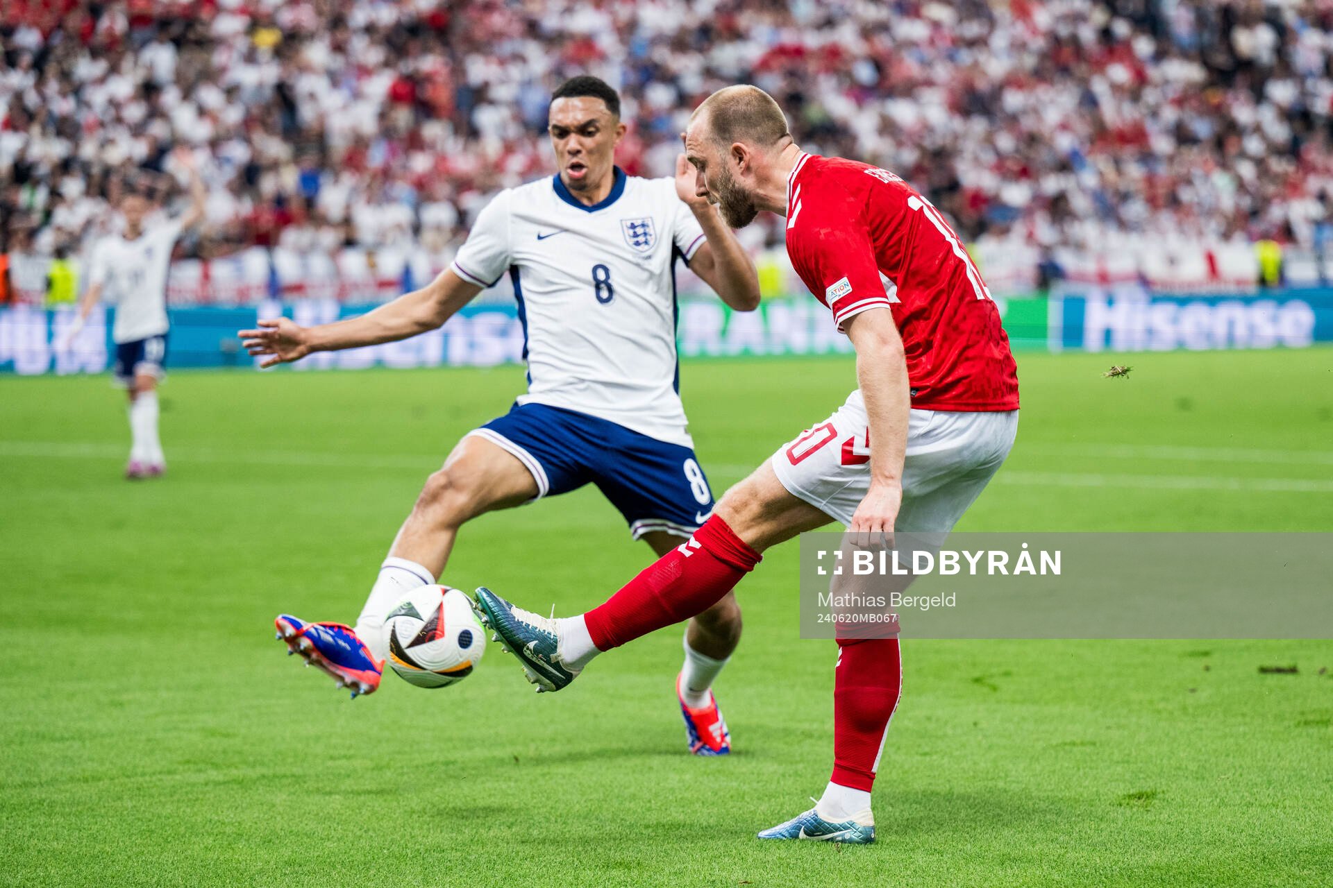 Trent Alexander-Arnold of England and Christian Eriksen of