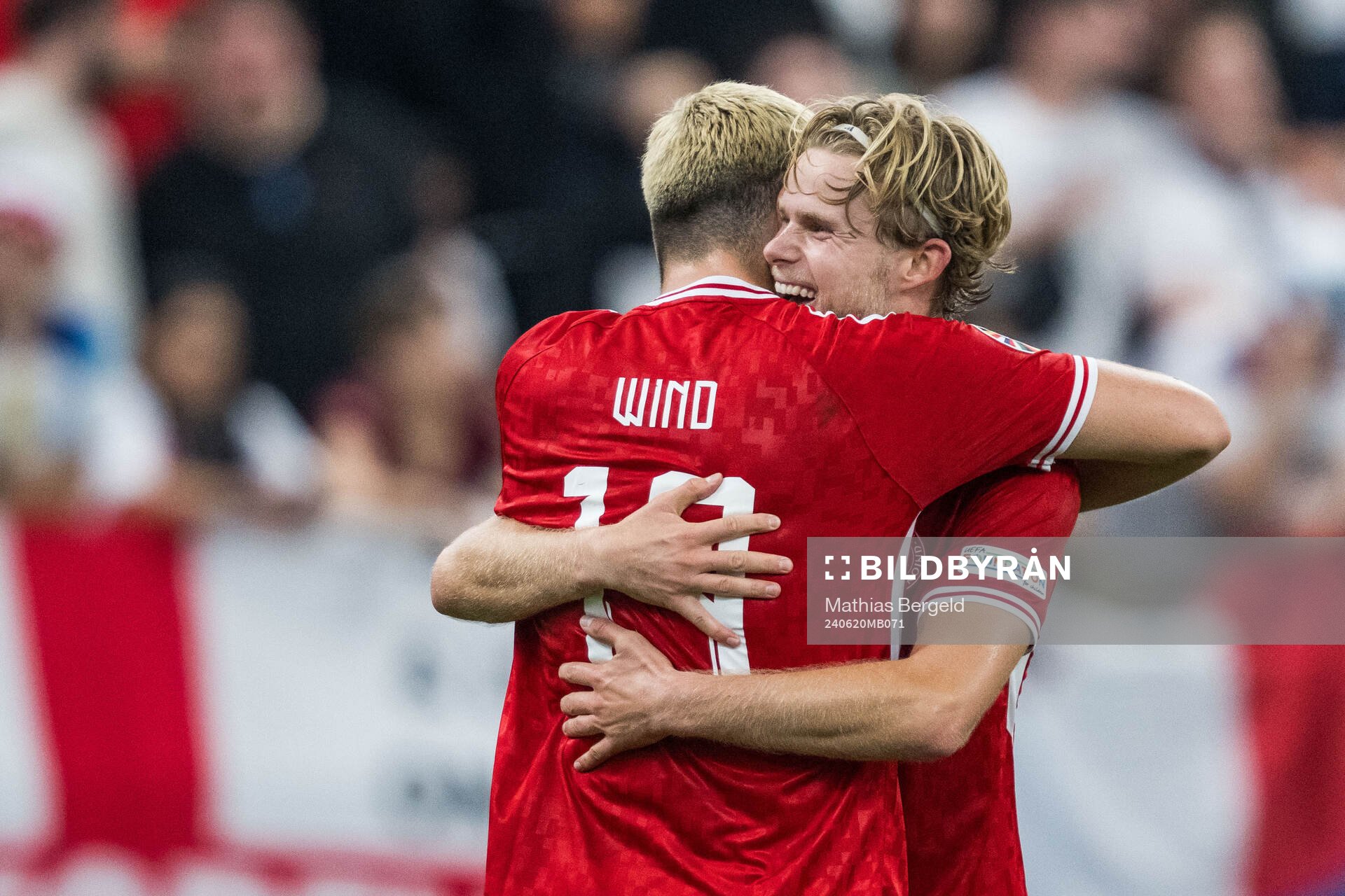Morten Hjulmand and Jonas Wind of Denmark celebrate