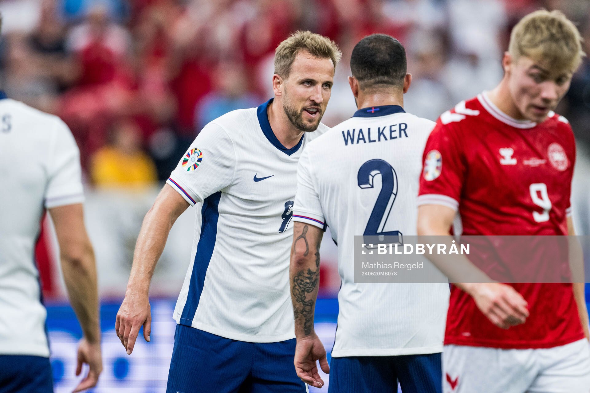 Harry Kane of England reacts against Kyle Walker