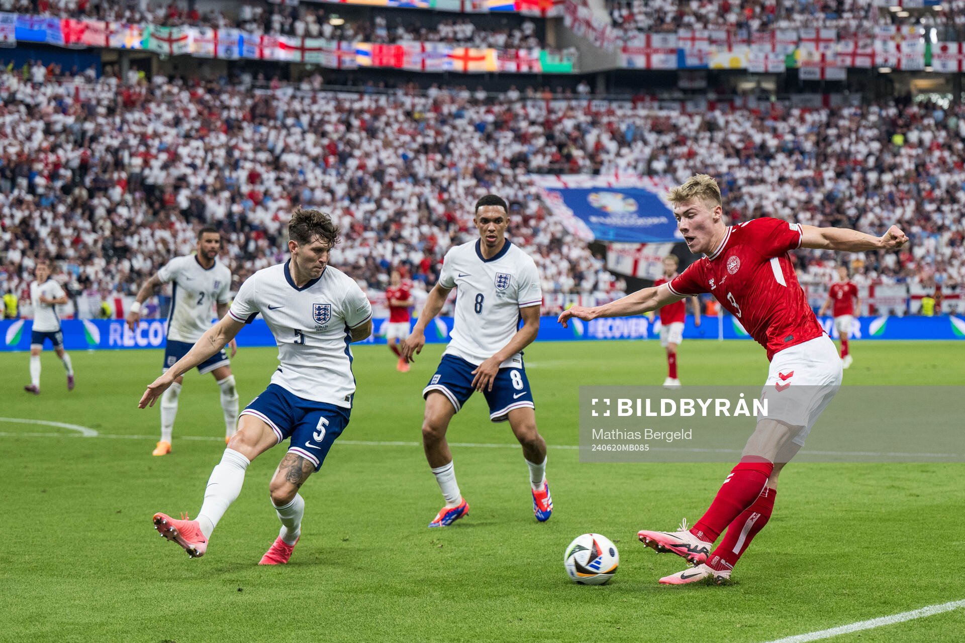 John Stones of England and Rasmus Højlund of Denmark