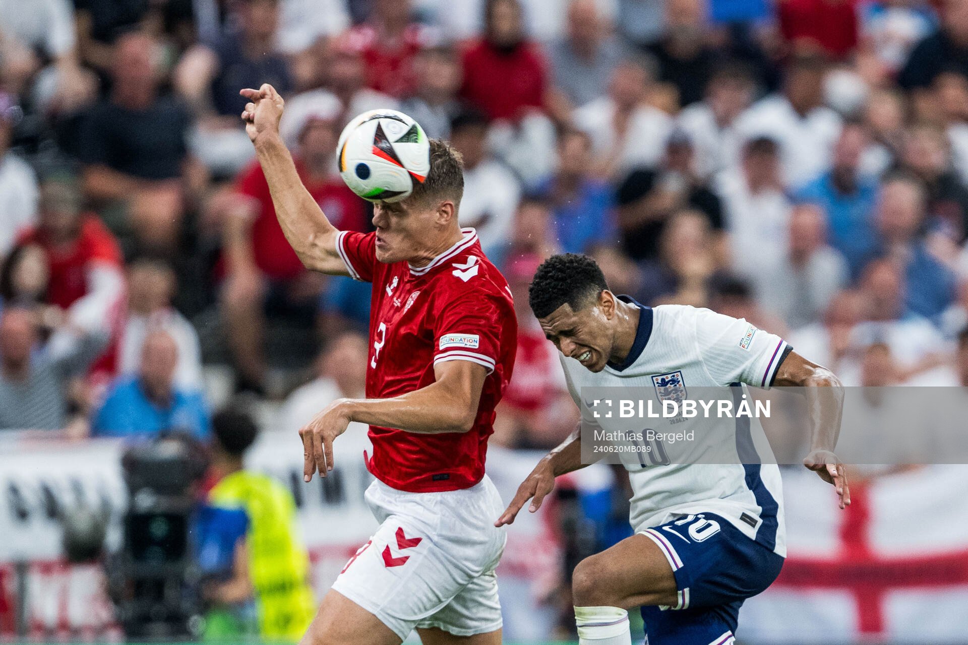 Jannik Vestergaard of Denmark and Jude Bellingham of England