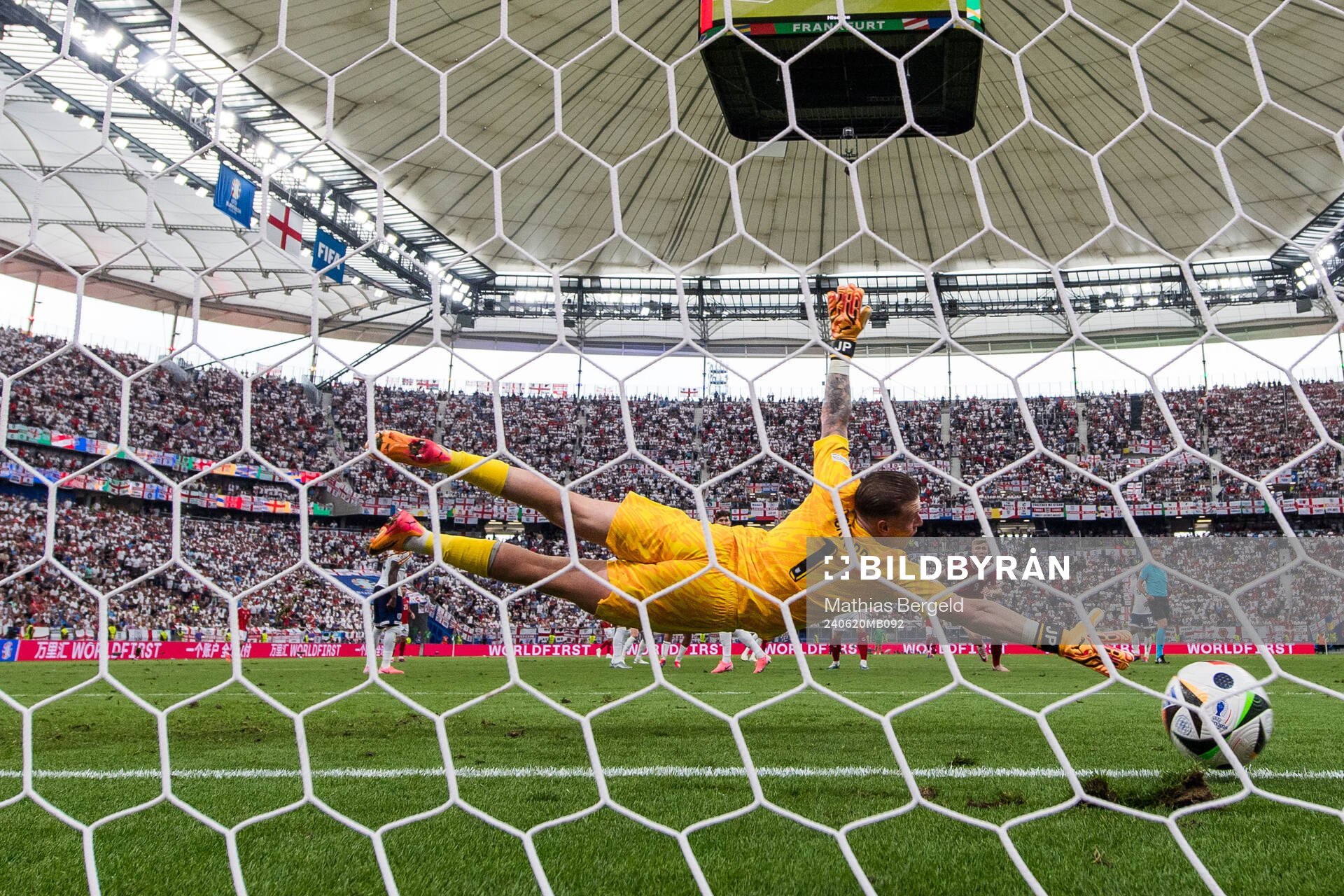Morten Hjulmand of Denmark (not pictured) scores 1-1 behind