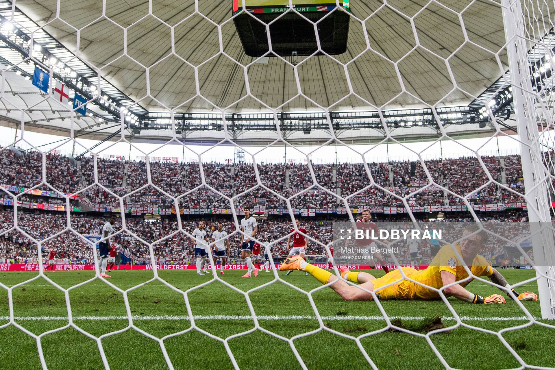 Goalkeeper Jordan Pickford of England looks dejected