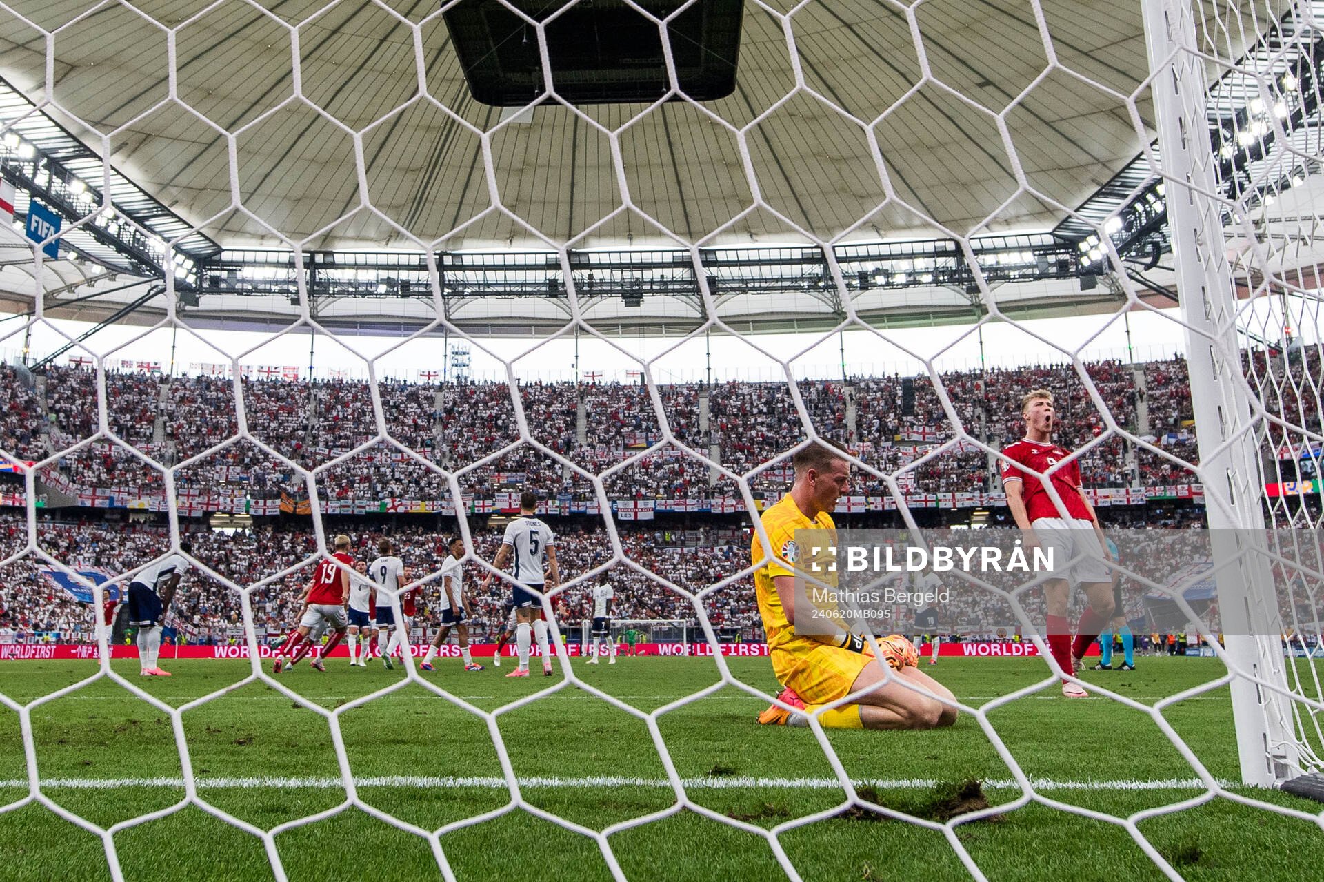 Goalkeeper Jordan Pickford of England looks dejected