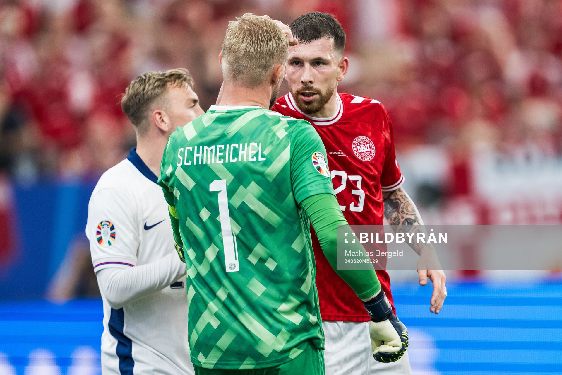 Pierre-Emil Højberg of Denmark celebrates with goalkeeper
