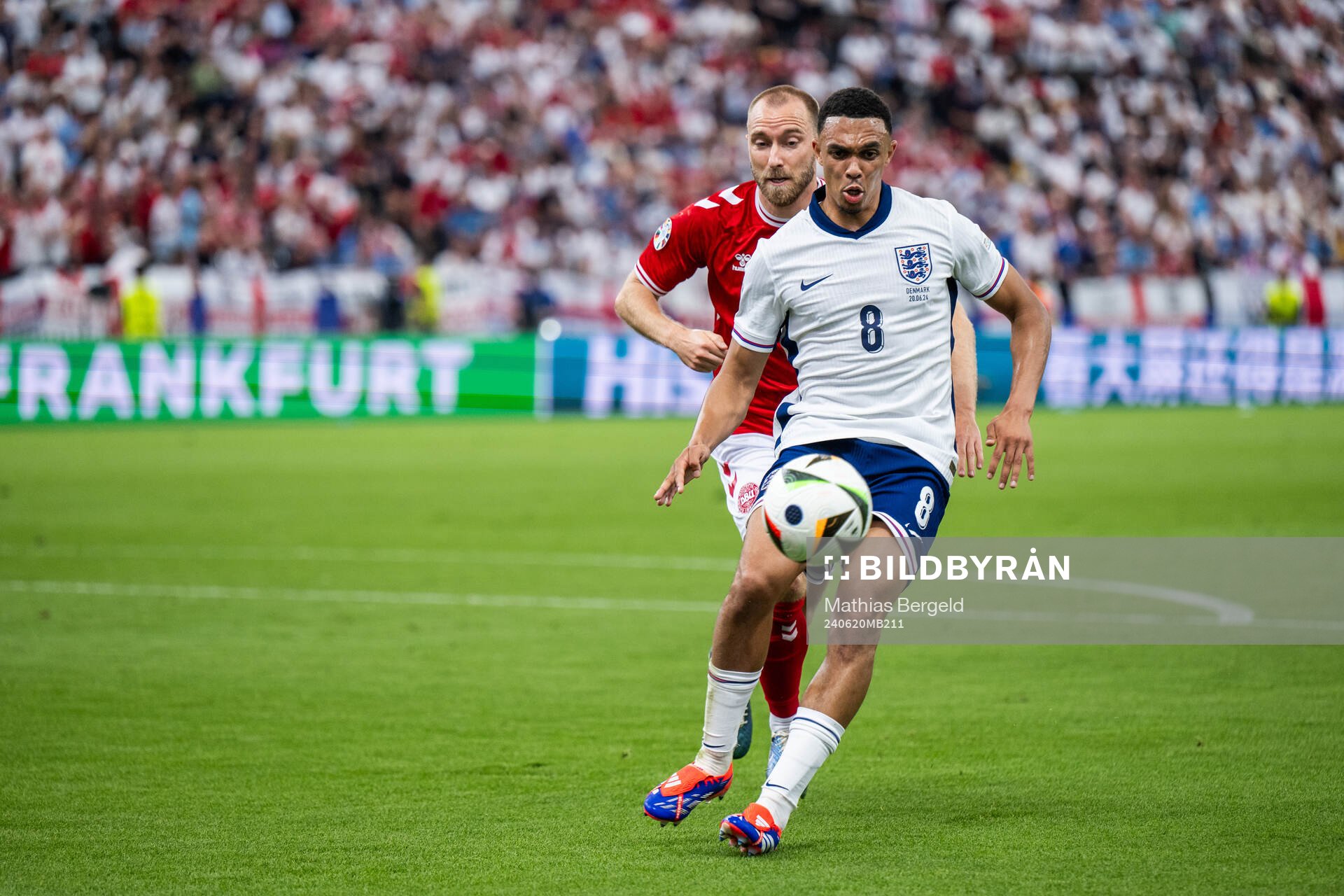 Trent Alexander-Arnold of England and Christian Eriksen of