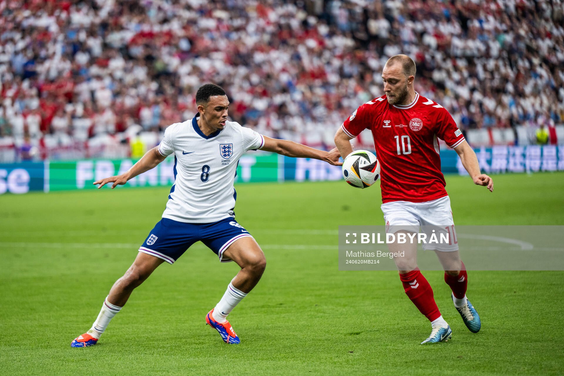 Trent Alexander-Arnold of England and Christian Eriksen of
