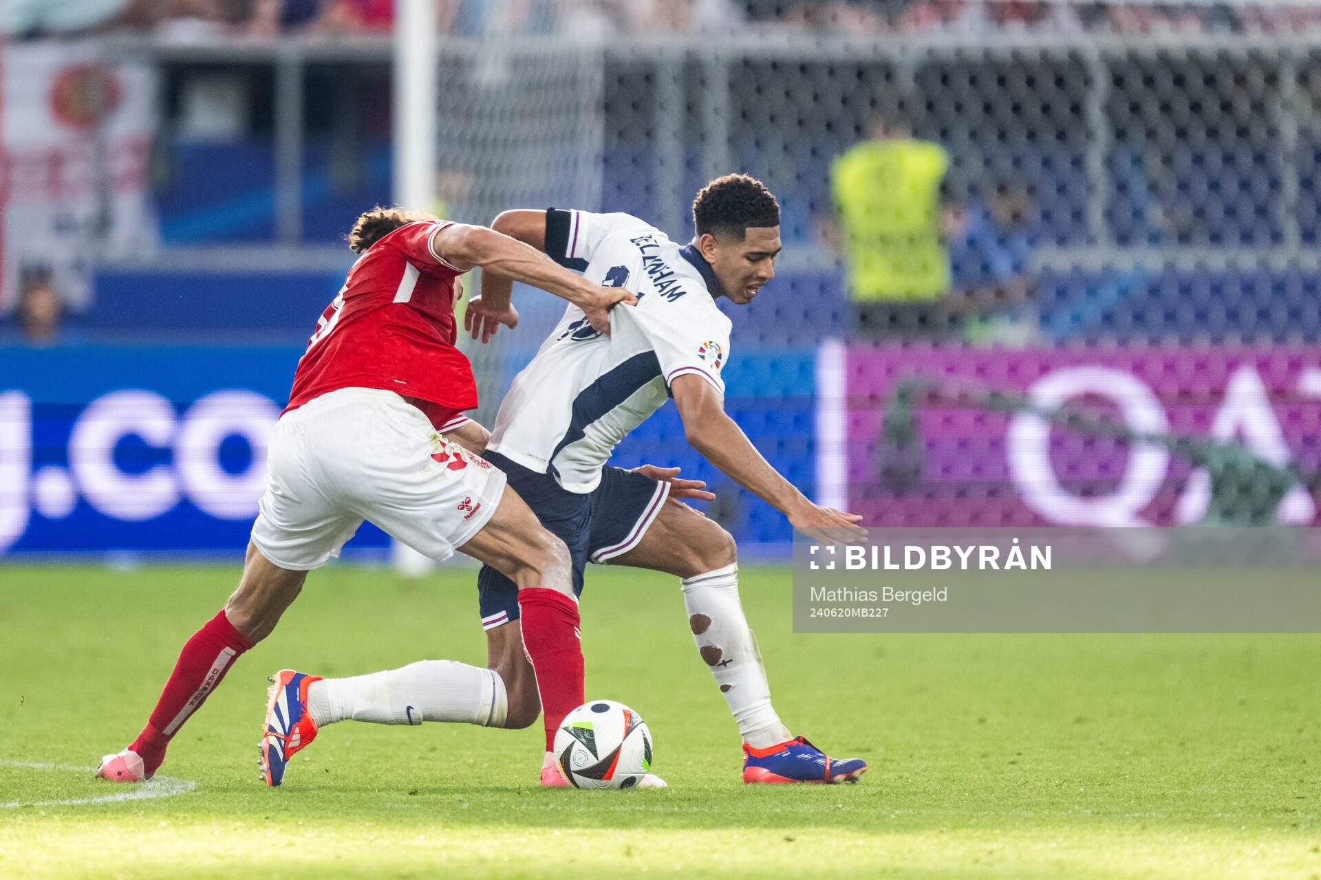 Yussuf Poulsen of Denmark and Jude Bellingham of England