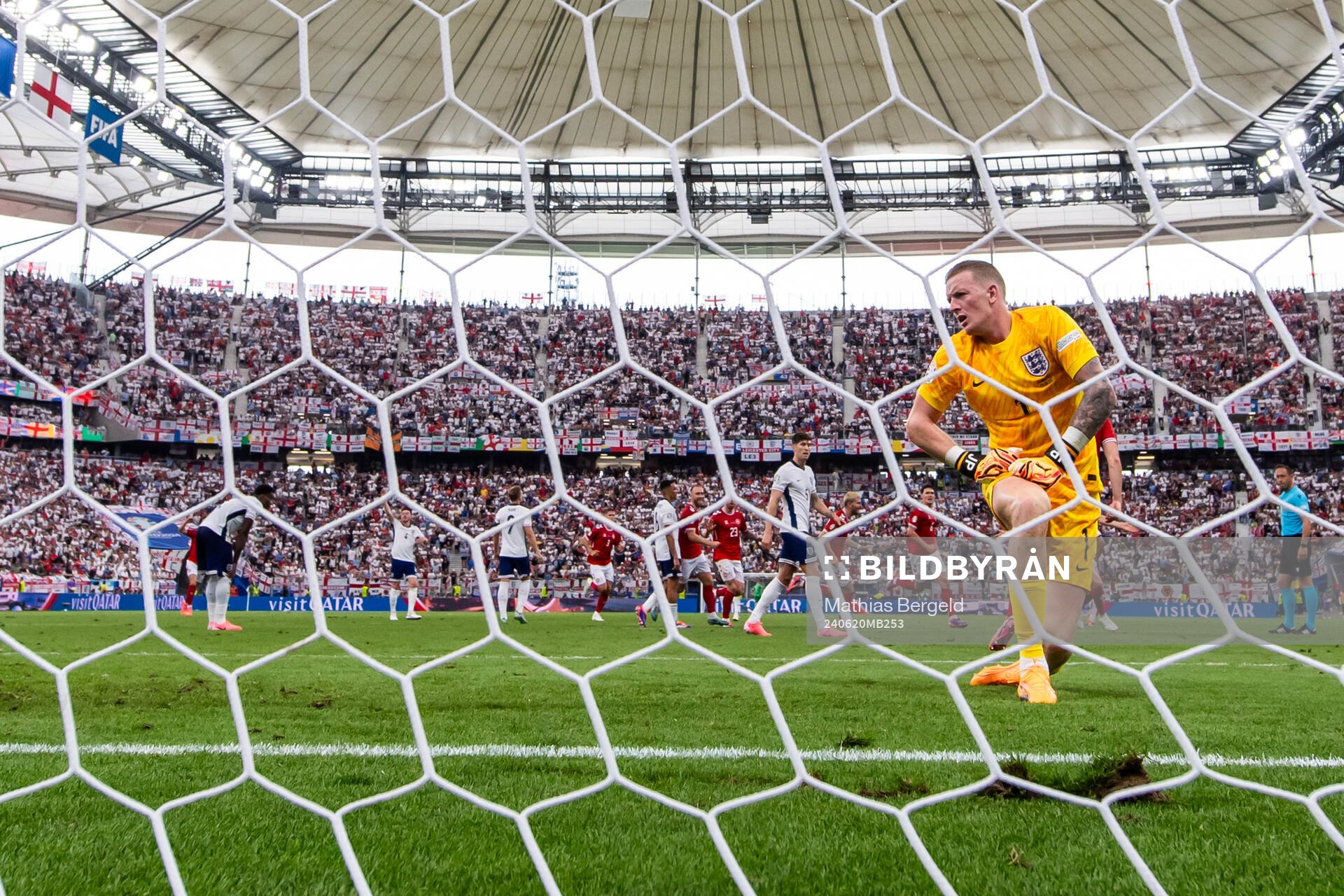 Goalkeeper Jordan Pickford of England looks dejected