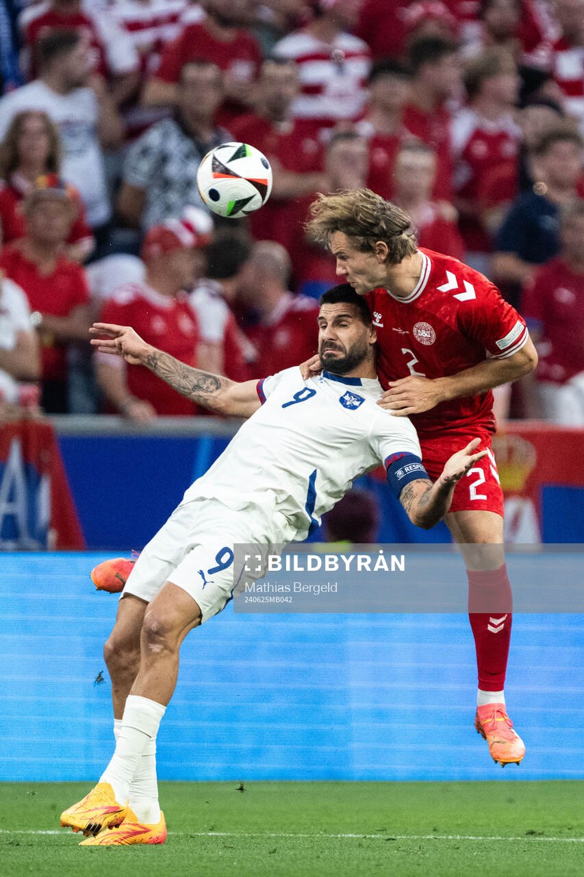 Aleksandar Mitrovic of Serbia and Joachim Christian