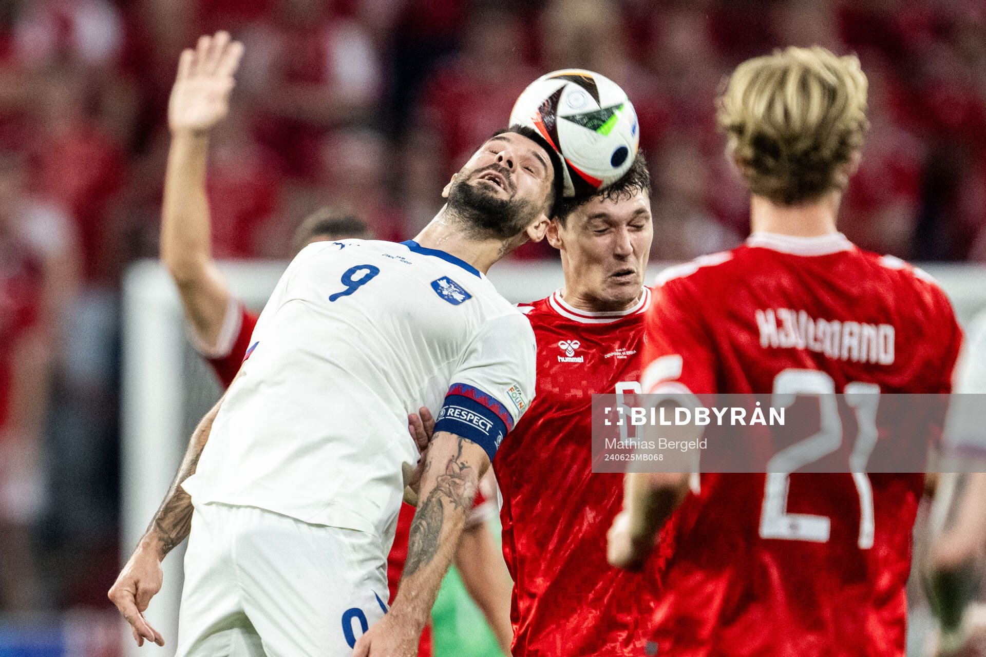 Aleksandar Mitrovic of Serbia and Andreas Kristiansen of
