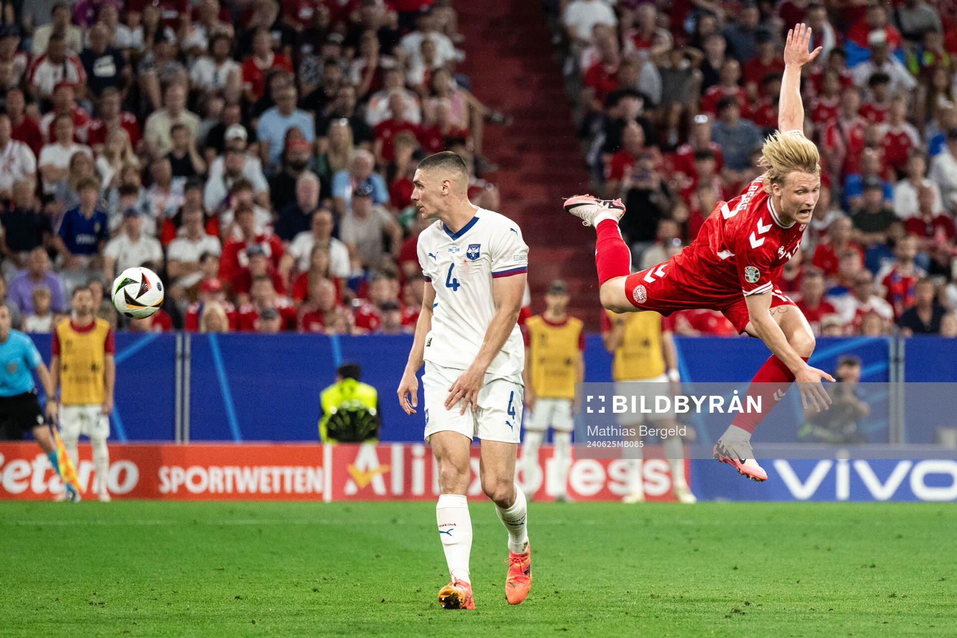 Nikola Milenkovic of Serbia and Kasper Dolberg of Denmark